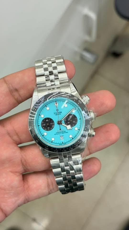 May be an image of wrist watch and text
