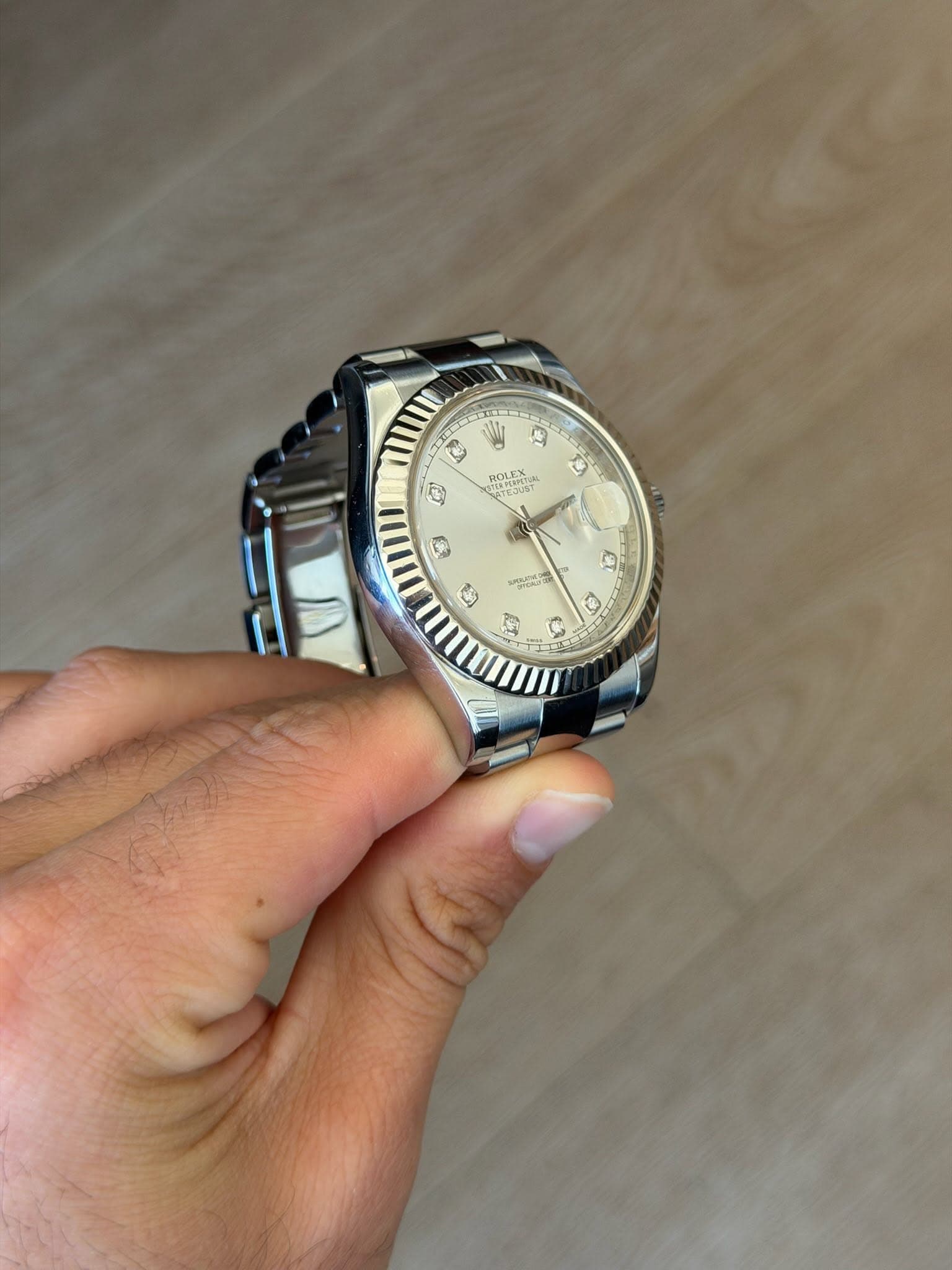 May be an image of digital watch and text