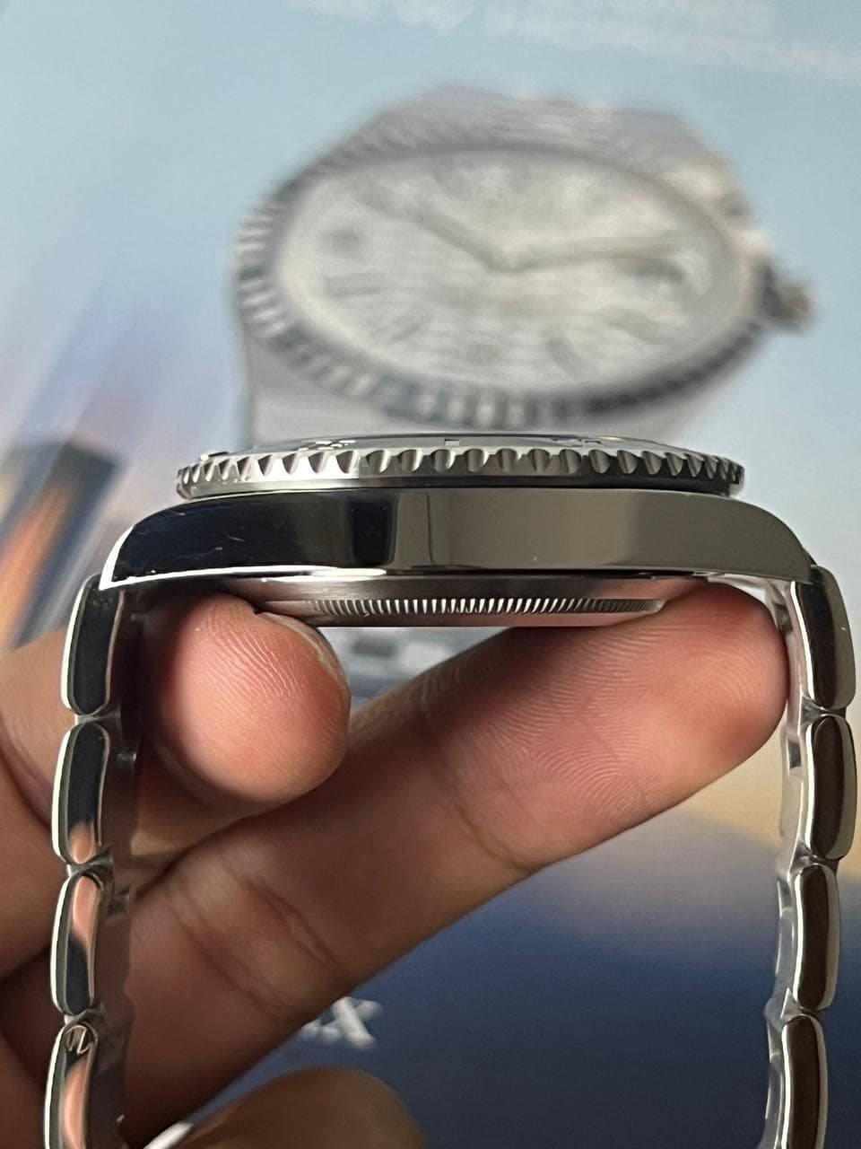 May be an image of wrist watch