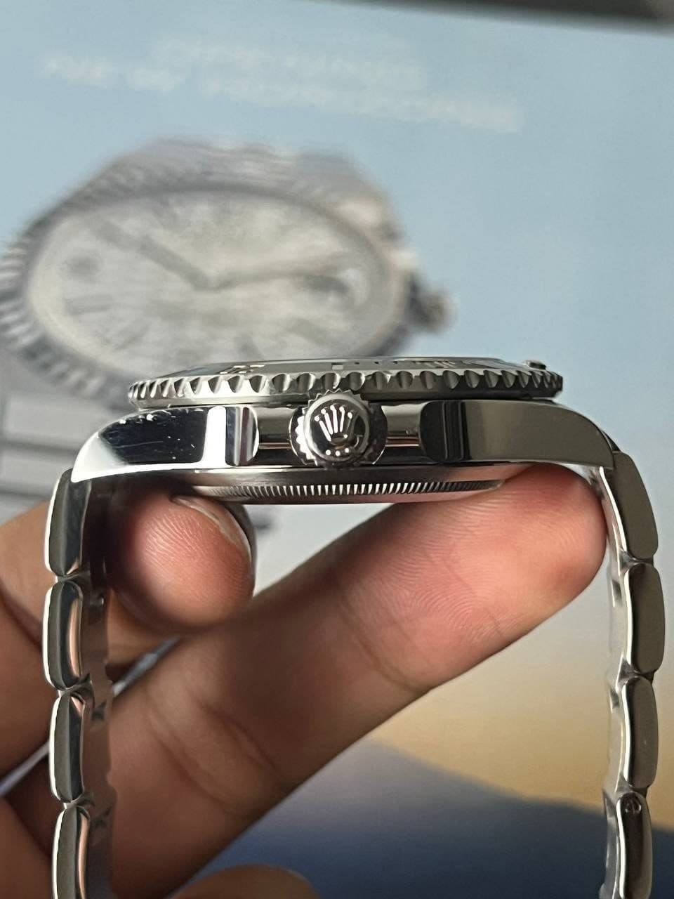 May be an image of wrist watch