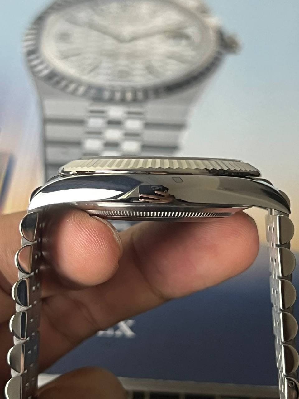 May be an image of wrist watch