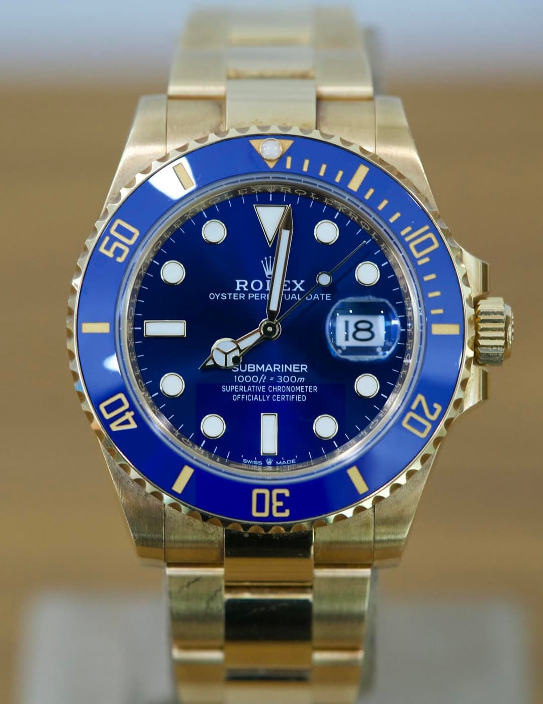 May be an image of wrist watch and text that says '50 ROI ROIEX EX OYSTER OYSTERPERIJUAL/JATE TER PERI UAL DATE 10 18 SUBMARINER 1000ft 300m SUP SUPERLATIVE HRONOMETER…