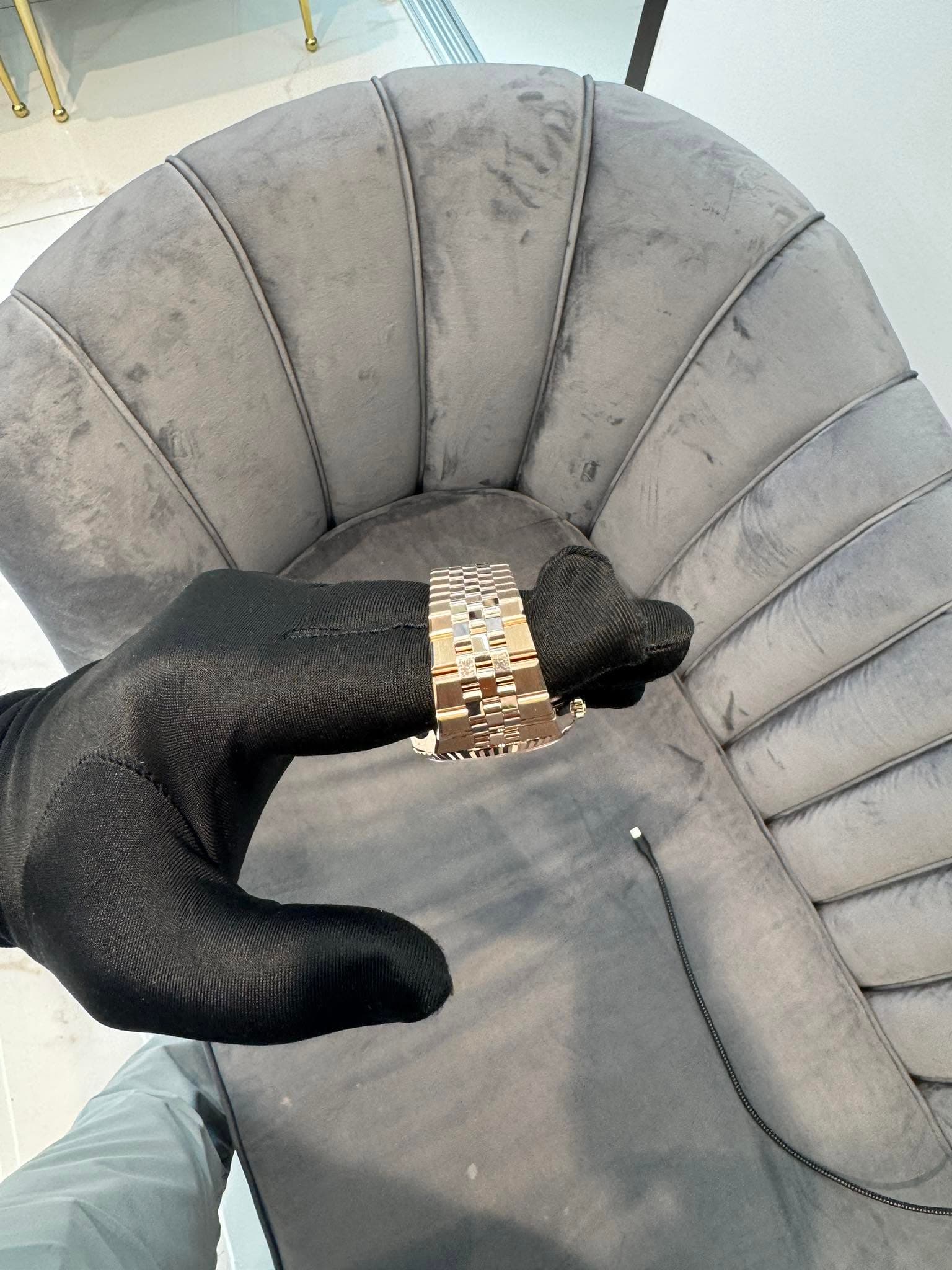 May be an image of leather and wrist watch