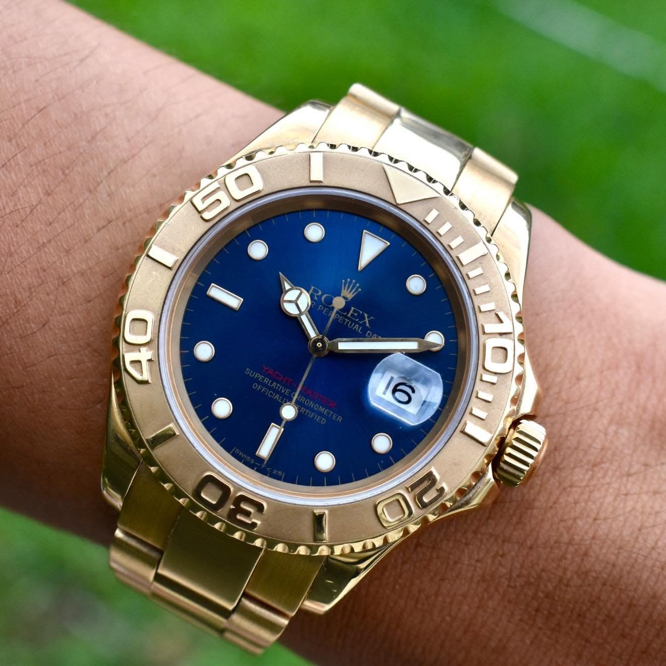 May be an image of wrist watch and text
