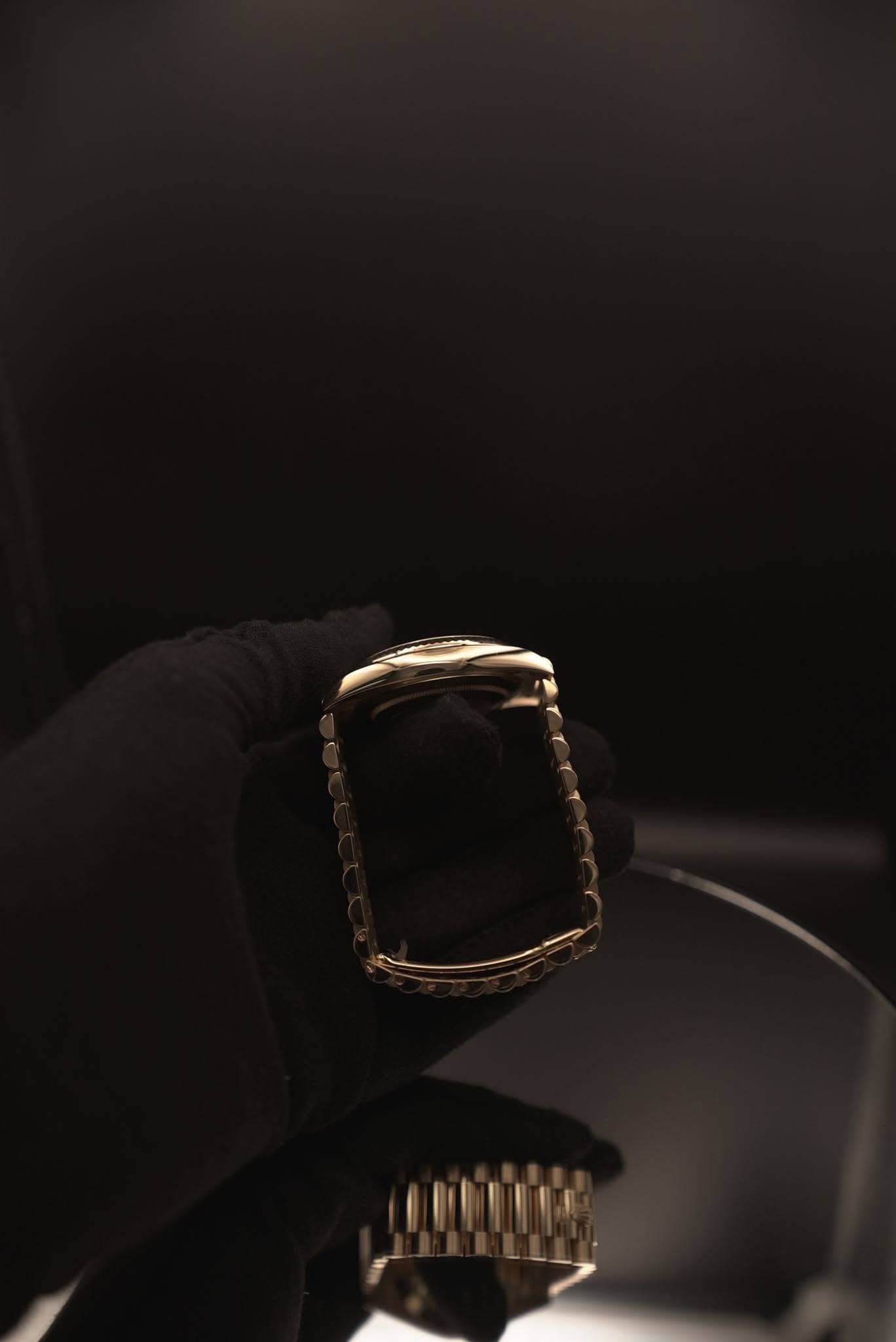 May be an image of wrist watch and ring