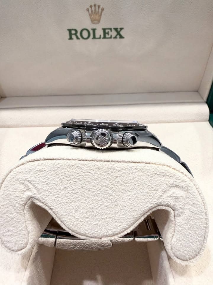 May be an image of wrist watch and text that says 'ROLEX'