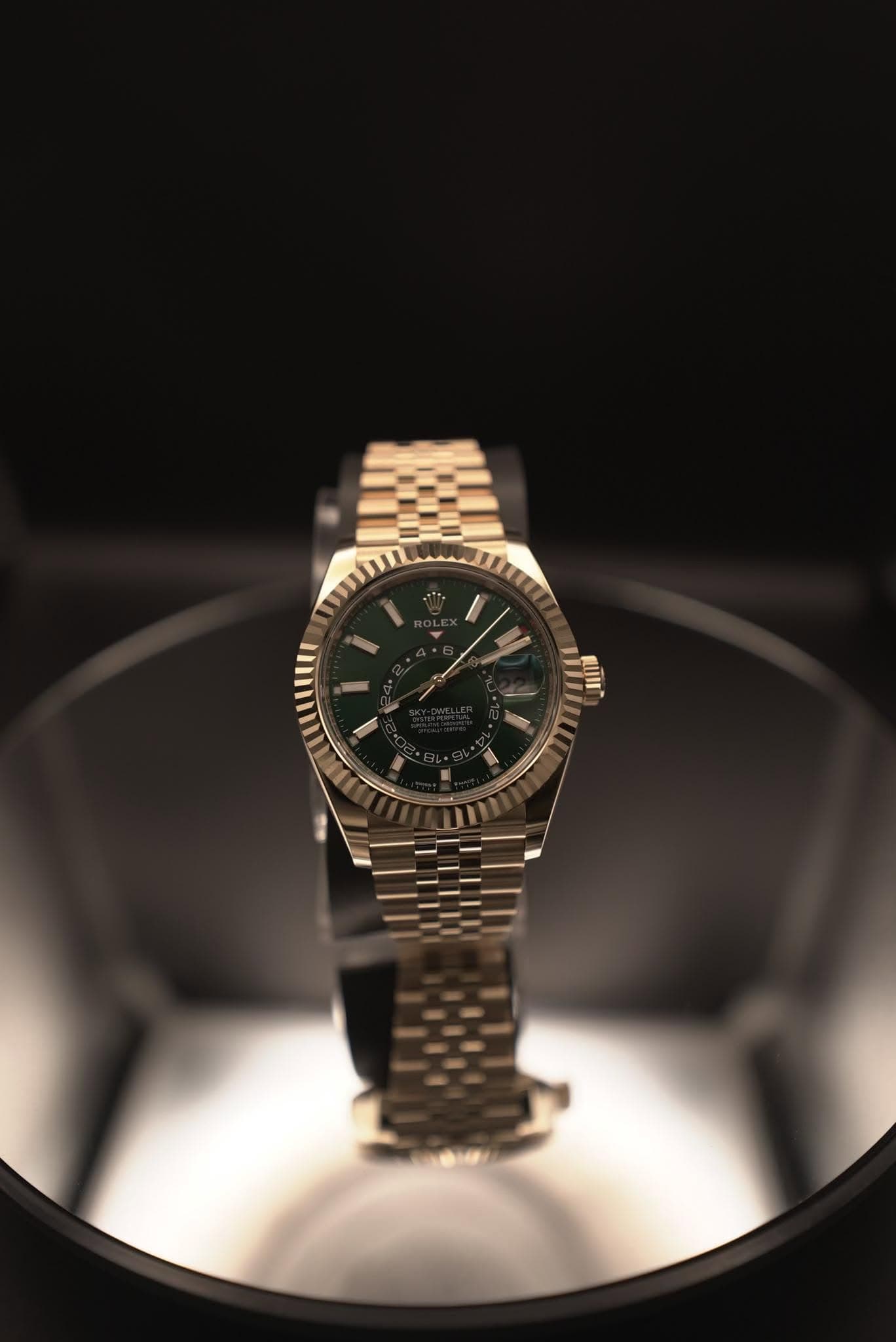 May be an image of wrist watch and text