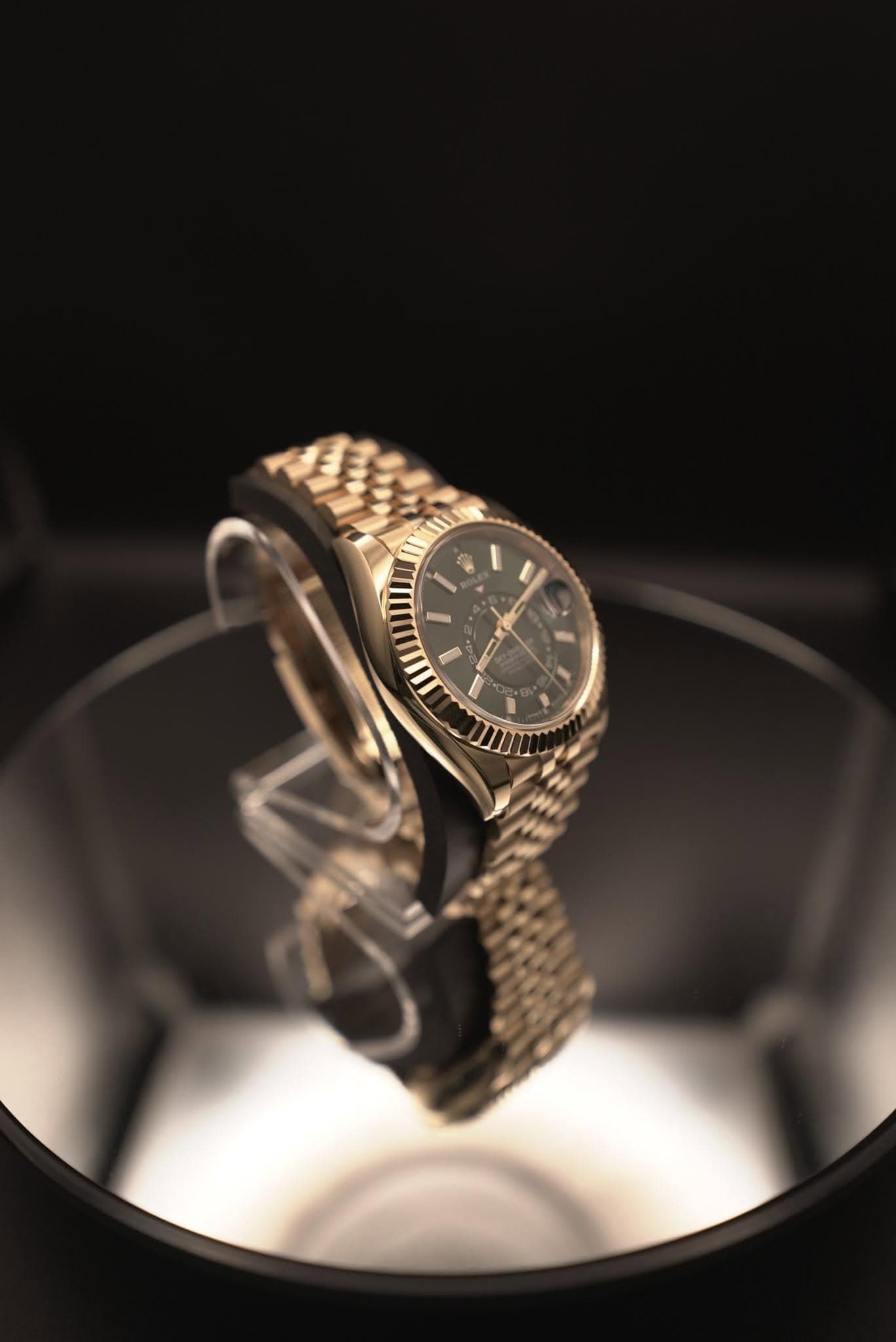 May be an image of wrist watch and text
