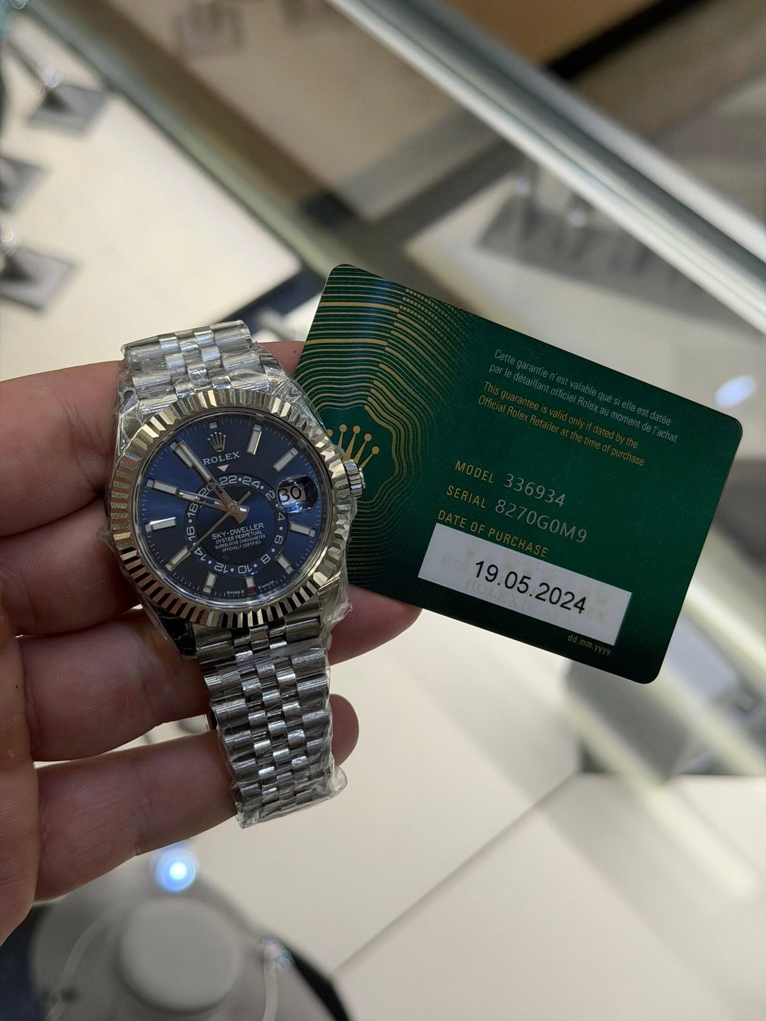 May be an image of wrist watch and text