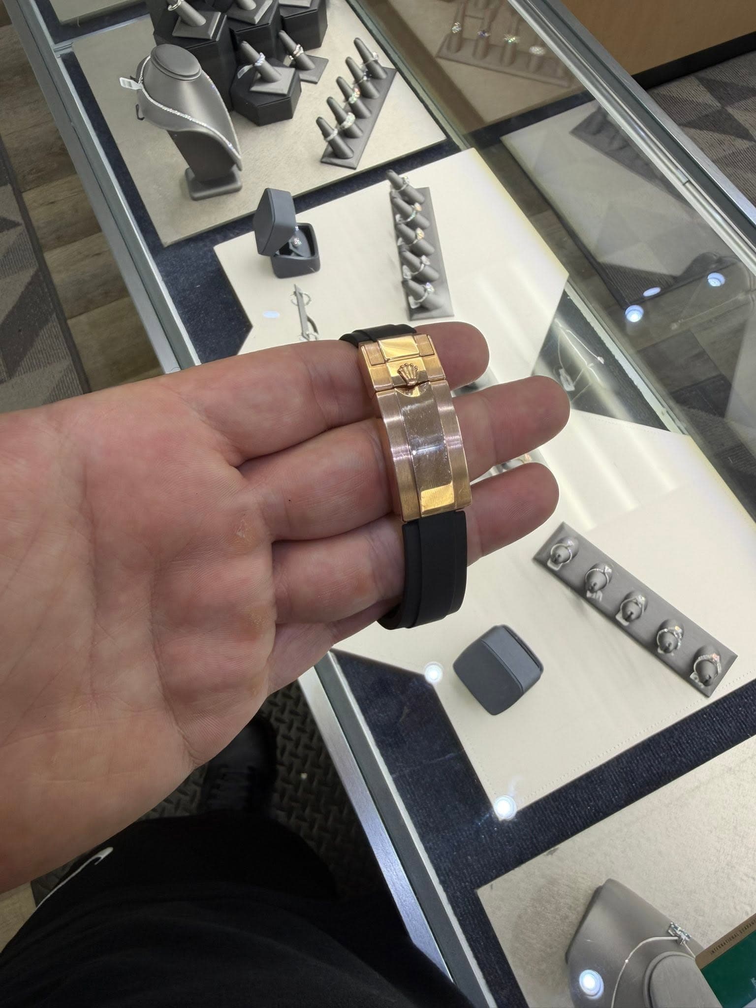 May be an image of wrist watch, ring and cufflinks