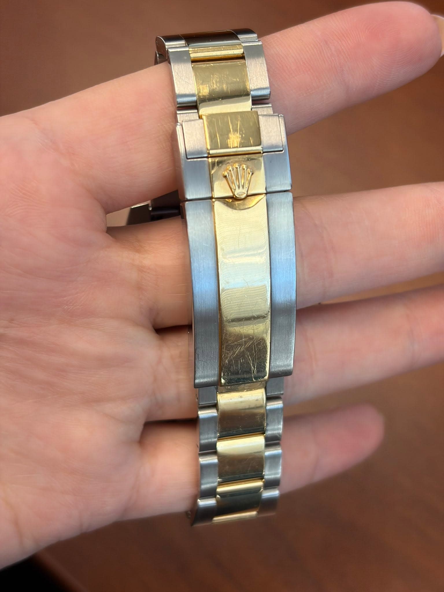 May be an image of wrist watch