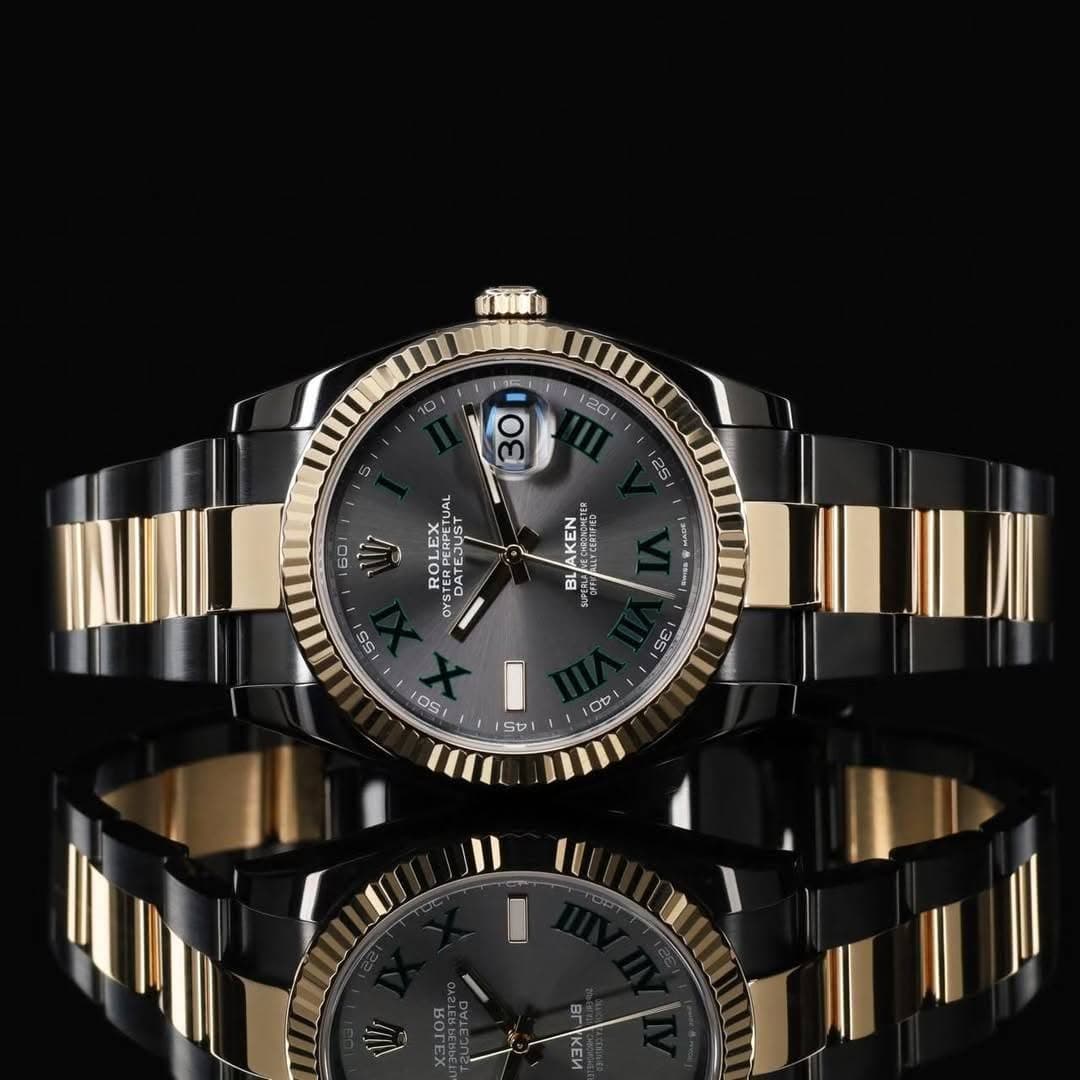 May be an image of wrist watch and text