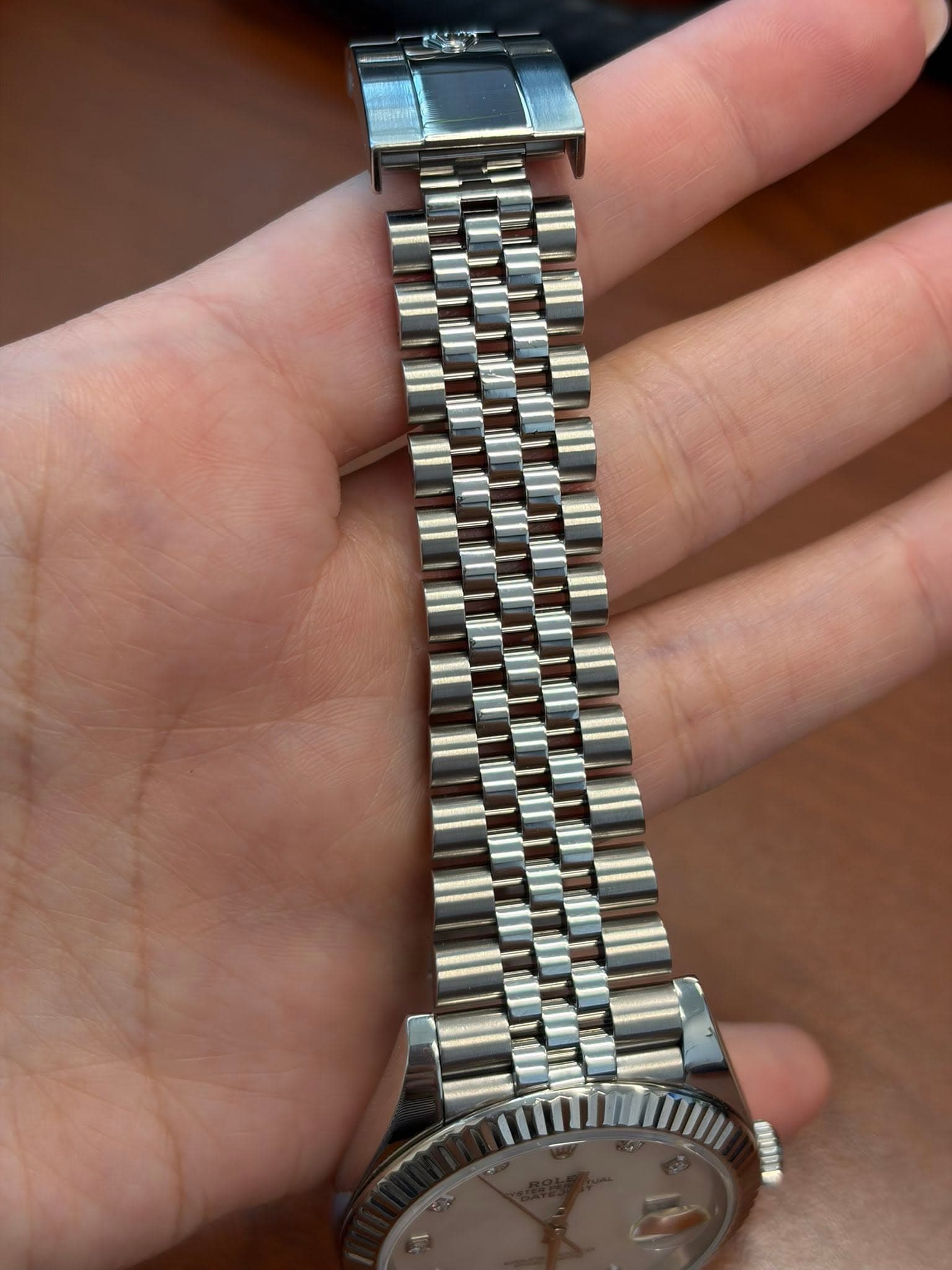 May be an image of wrist watch