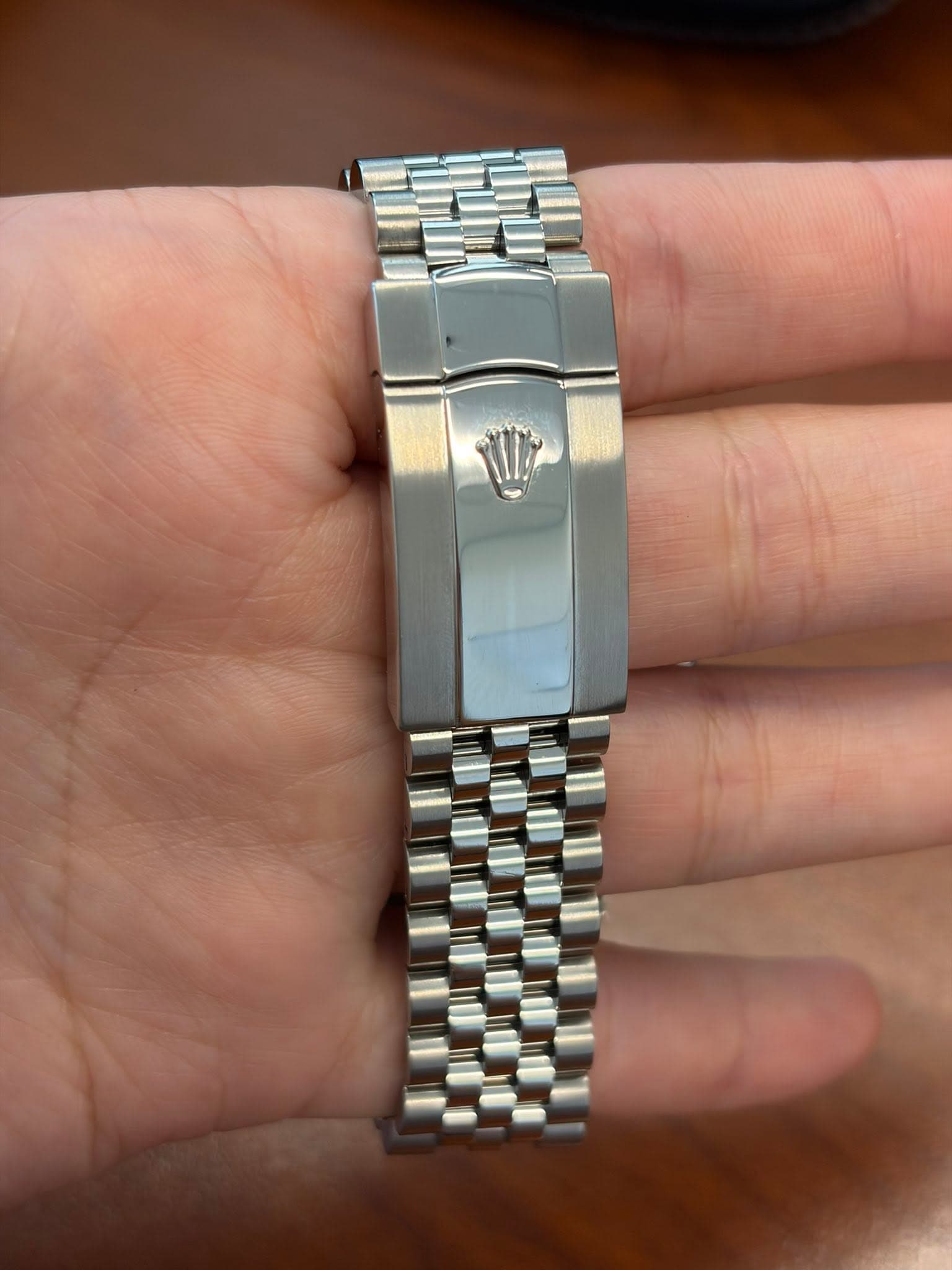 May be an image of wrist watch