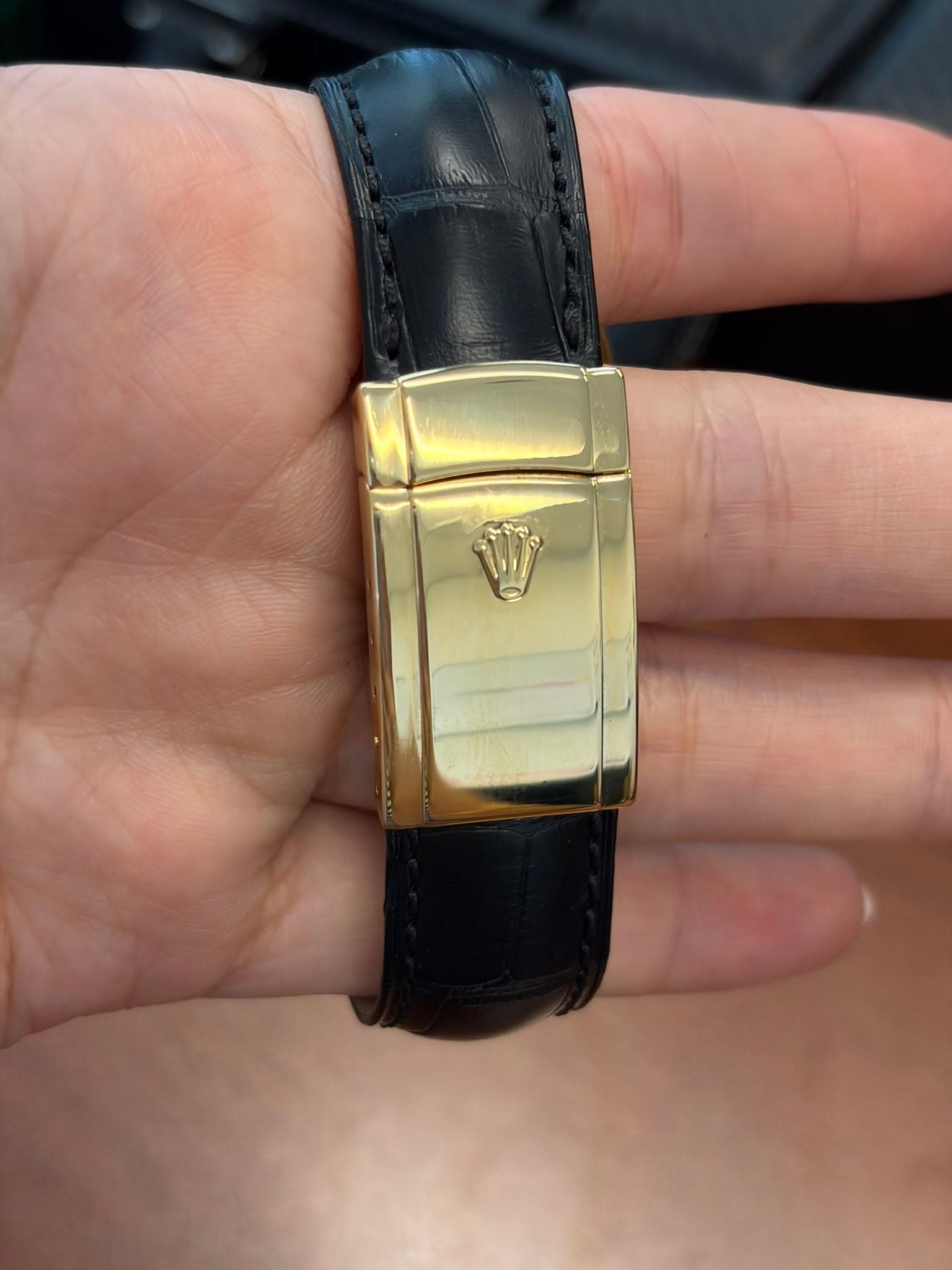 May be an image of wrist watch