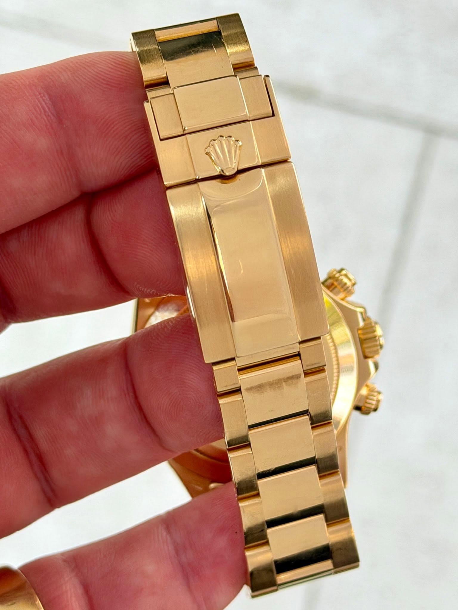 May be an image of wrist watch