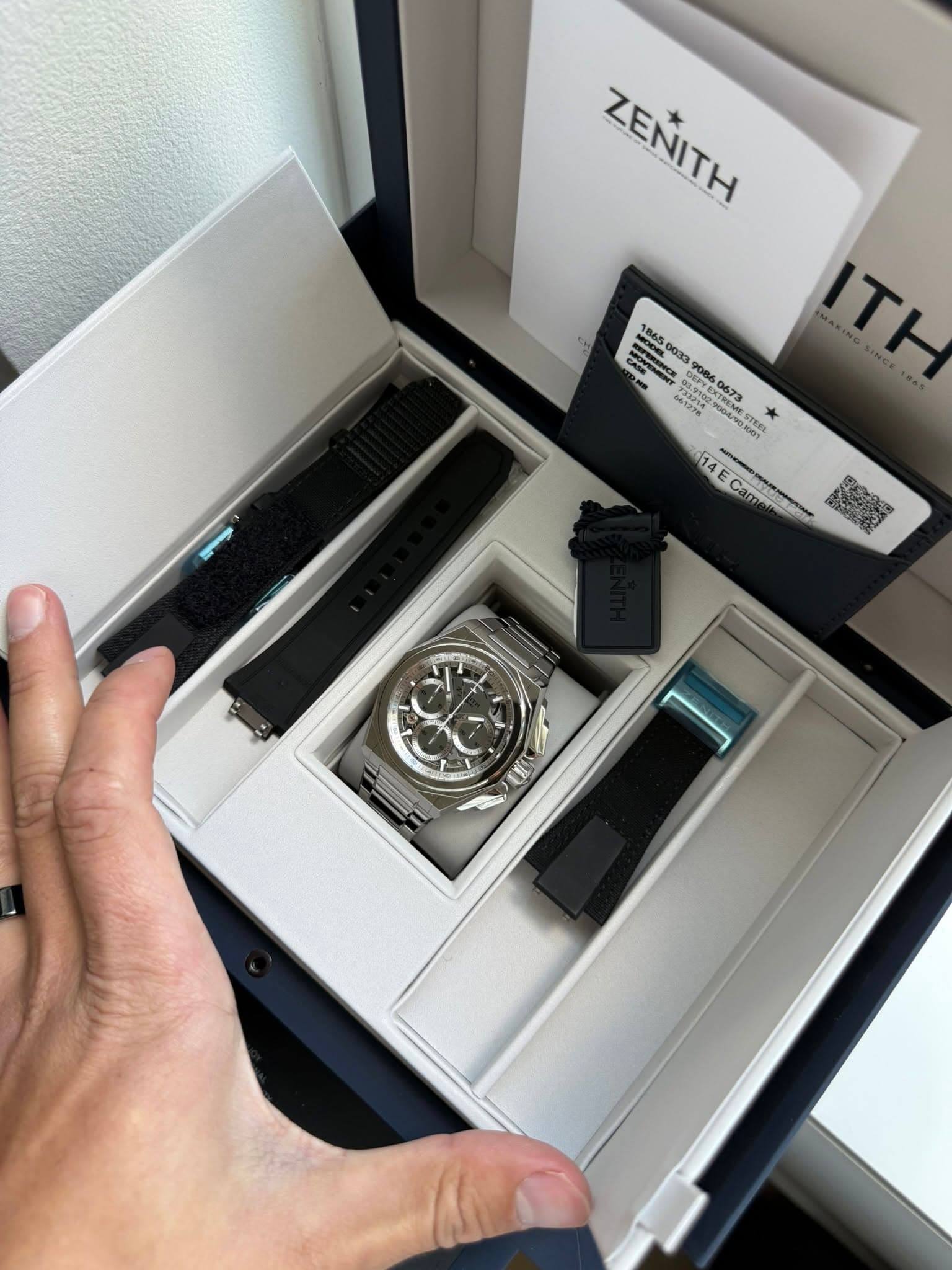 May be an image of wrist watch and text