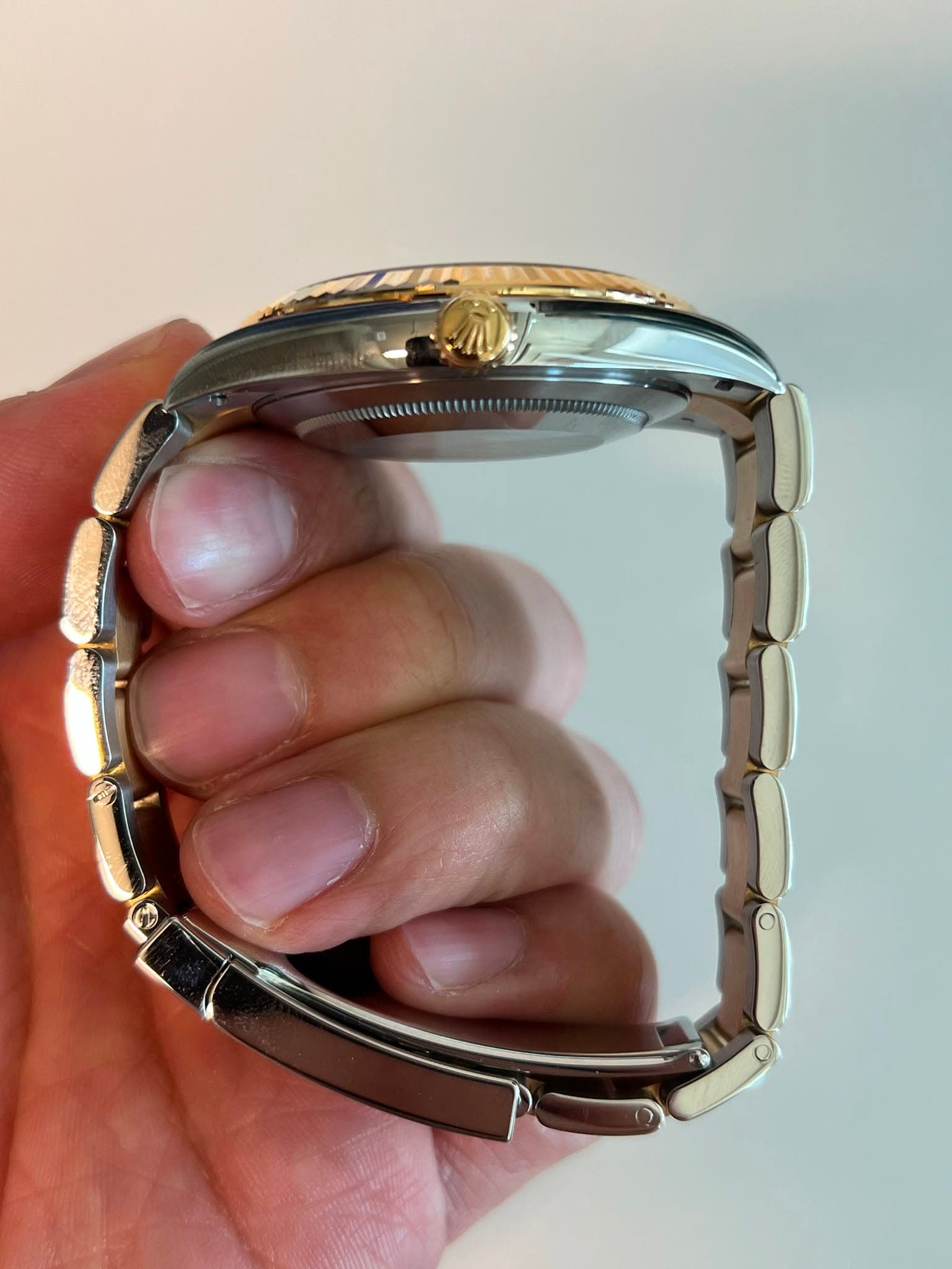 May be an image of wrist watch