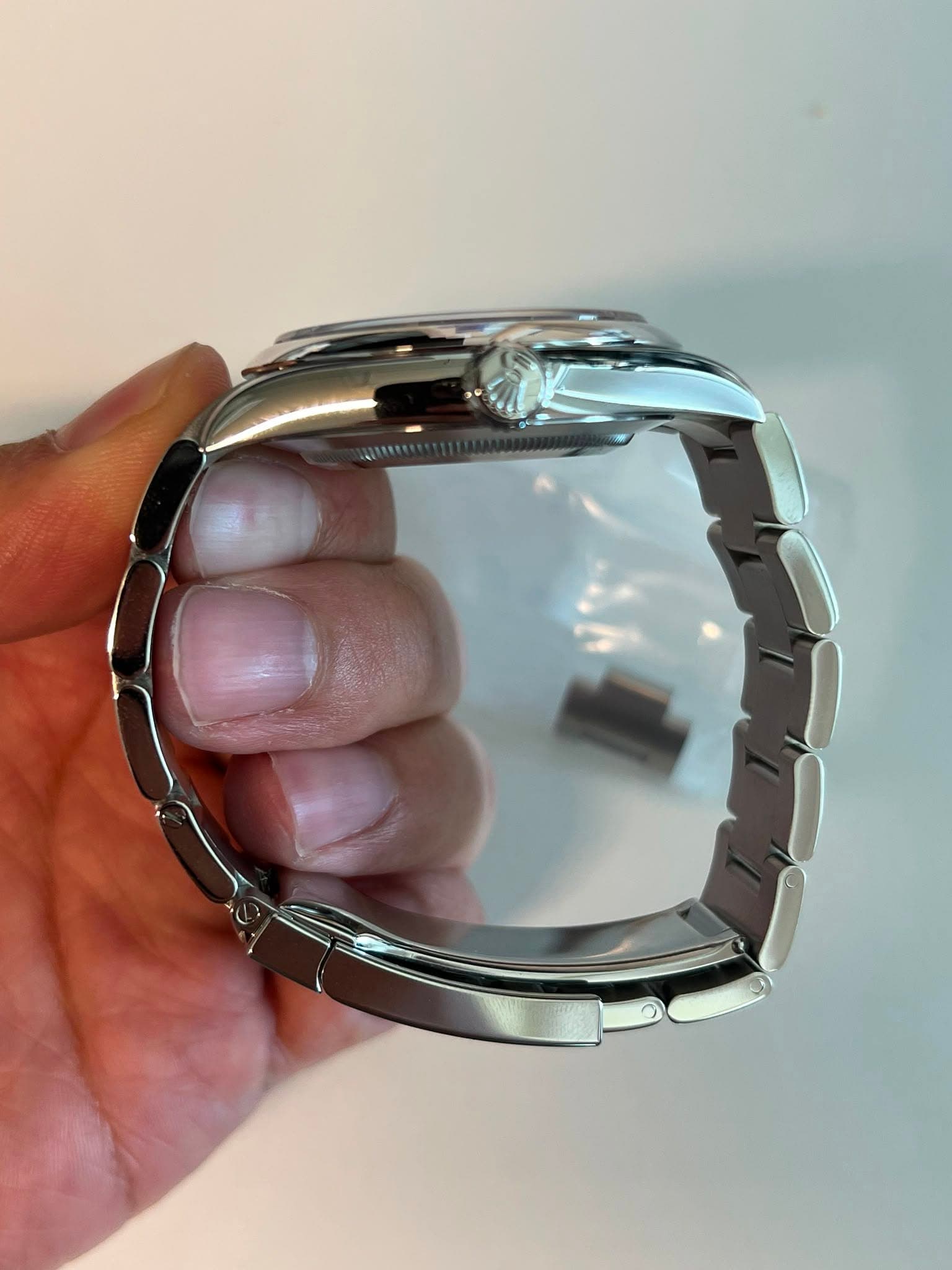 May be an image of wrist watch