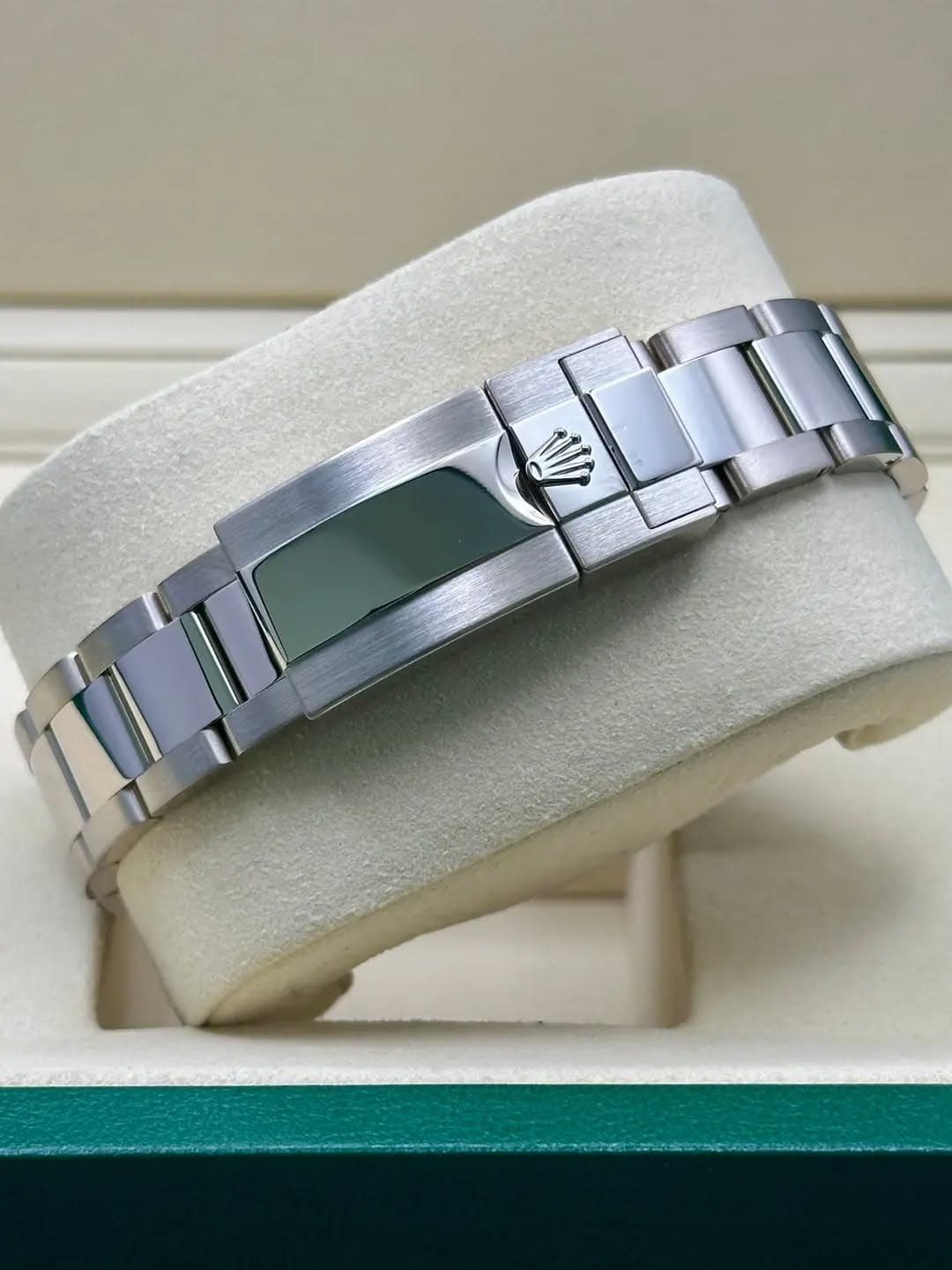 May be an image of jewelry, wrist watch and text
