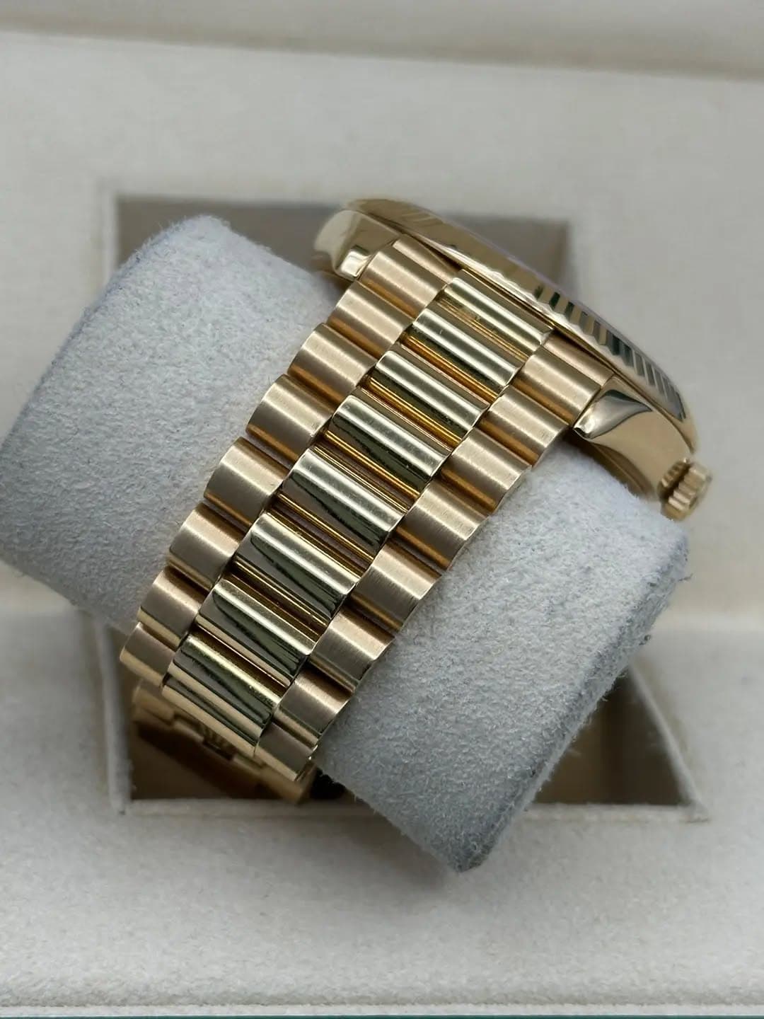 May be an image of jewelry, wrist watch and text