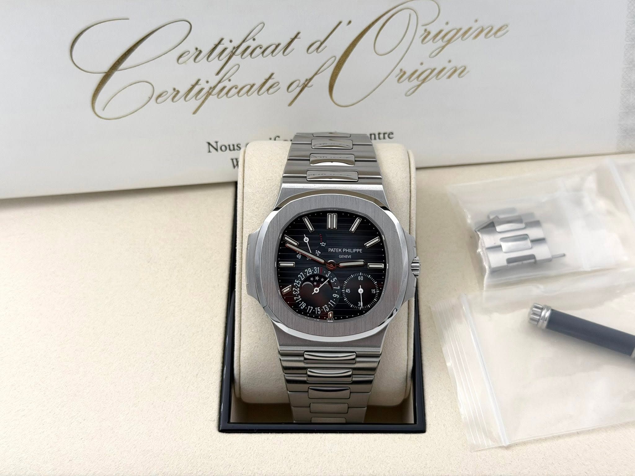 May be an image of wrist watch and text that says 'Coetfin, d Ougin rigin Dertifical Origine Dertificate ntre Nous 내 ='