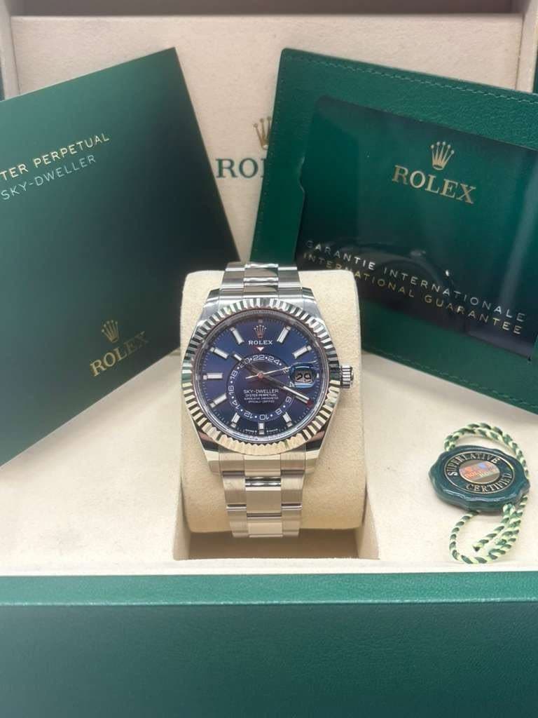 May be an image of wrist watch and text