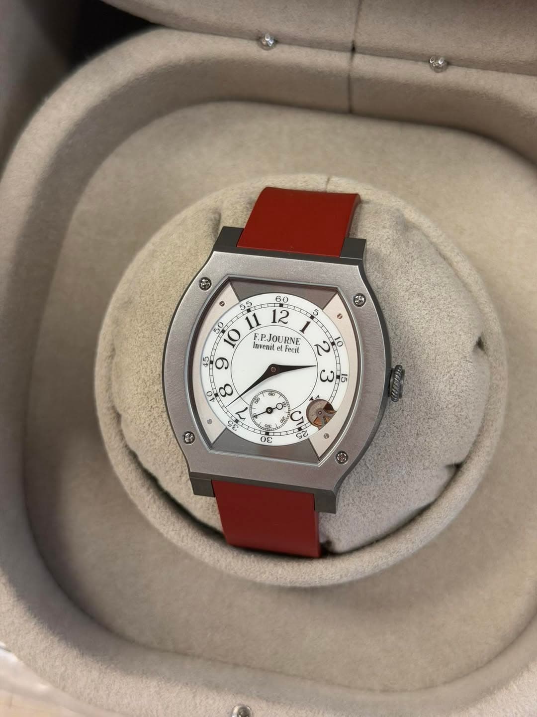 May be an image of wrist watch and text