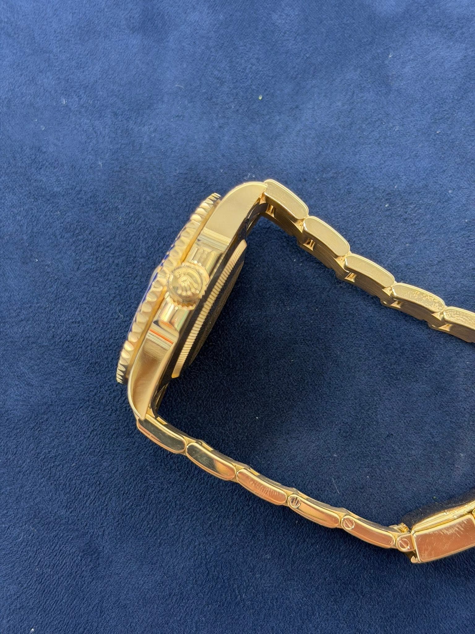 May be an image of jewelry and wrist watch