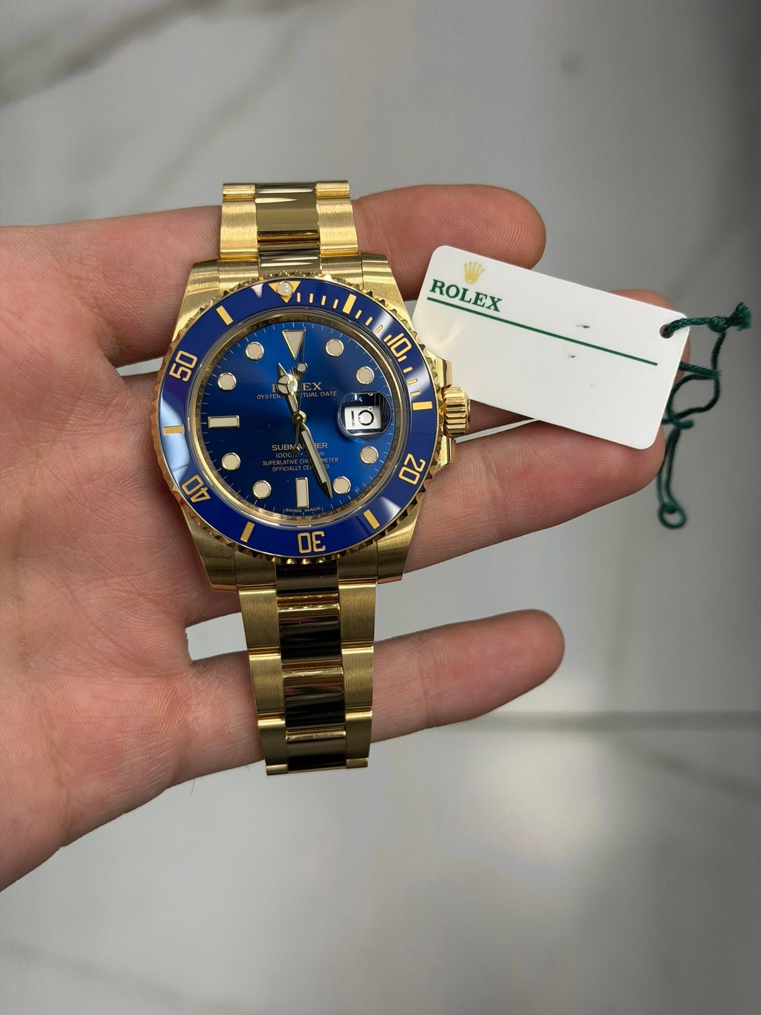 May be an image of wrist watch and text that says 'ROLEX ROLEX 10 50 10 ATIIH 00 40 DE'