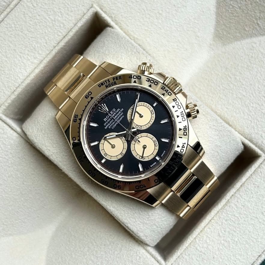 May be an image of wrist watch and text