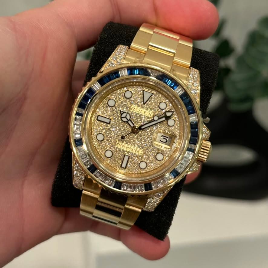 May be an image of wrist watch and text
