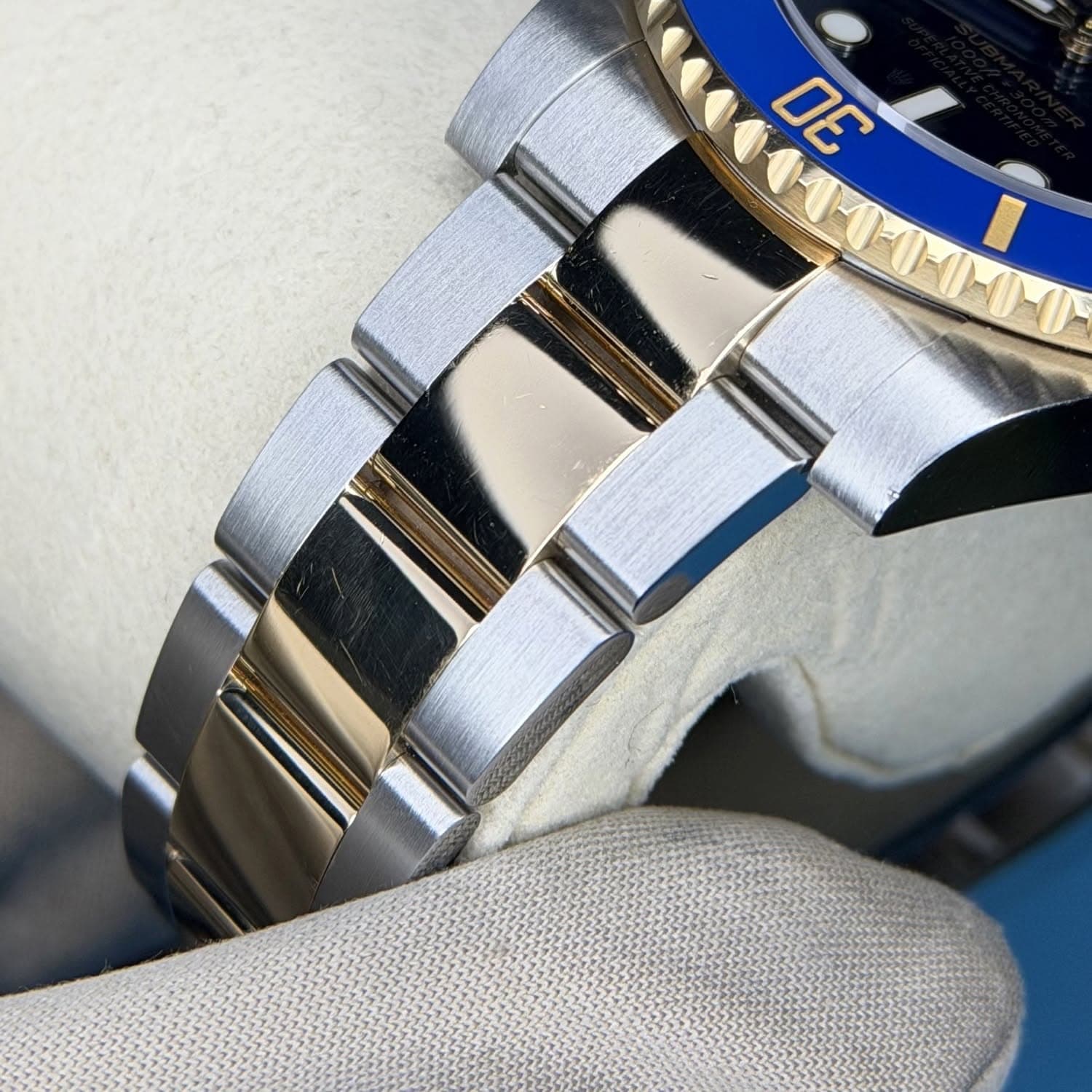 May be an image of wrist watch and text