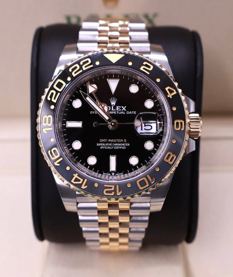May be an image of wrist watch and text