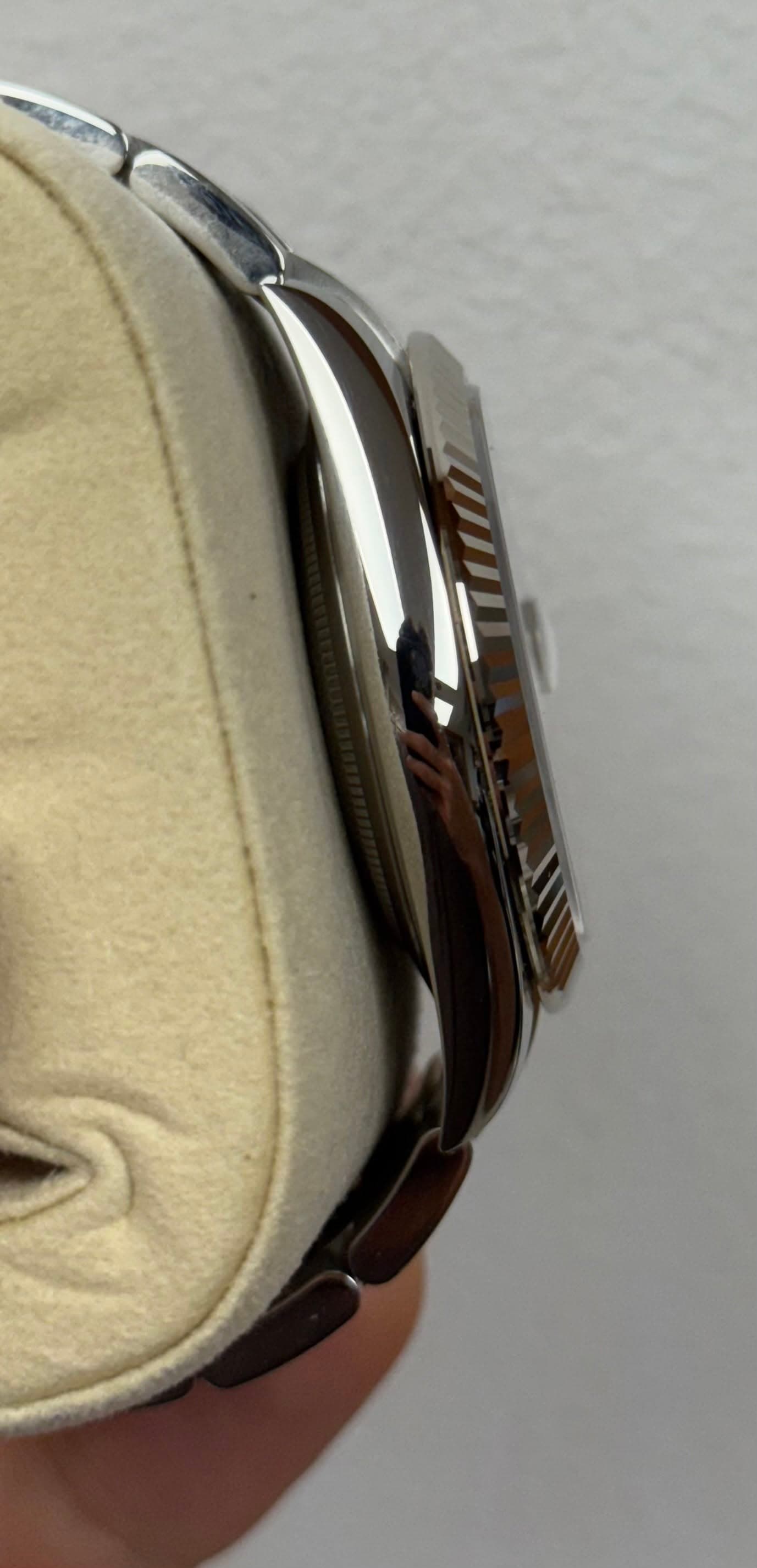May be an image of wrist watch