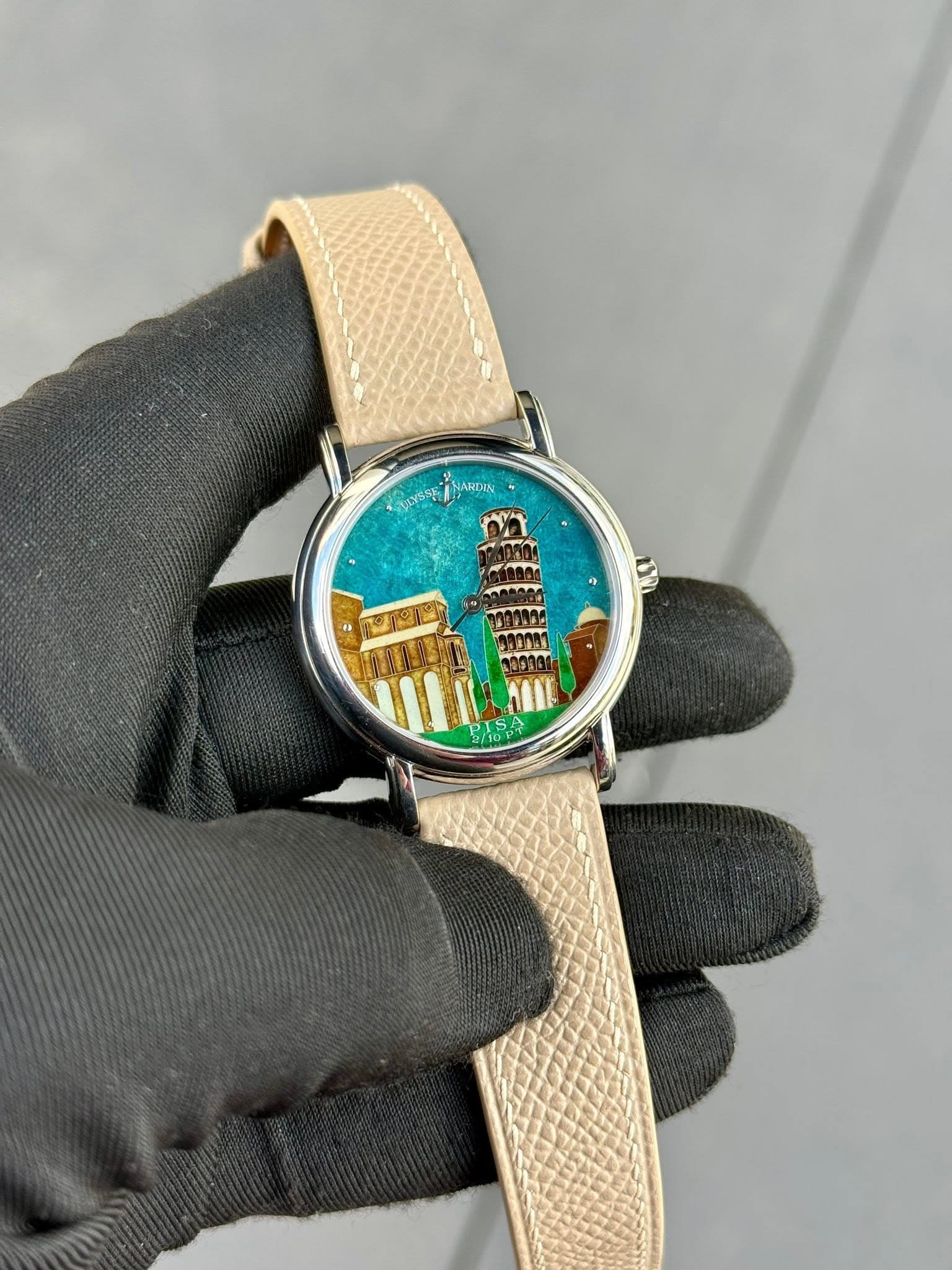 May be an image of wrist watch and text