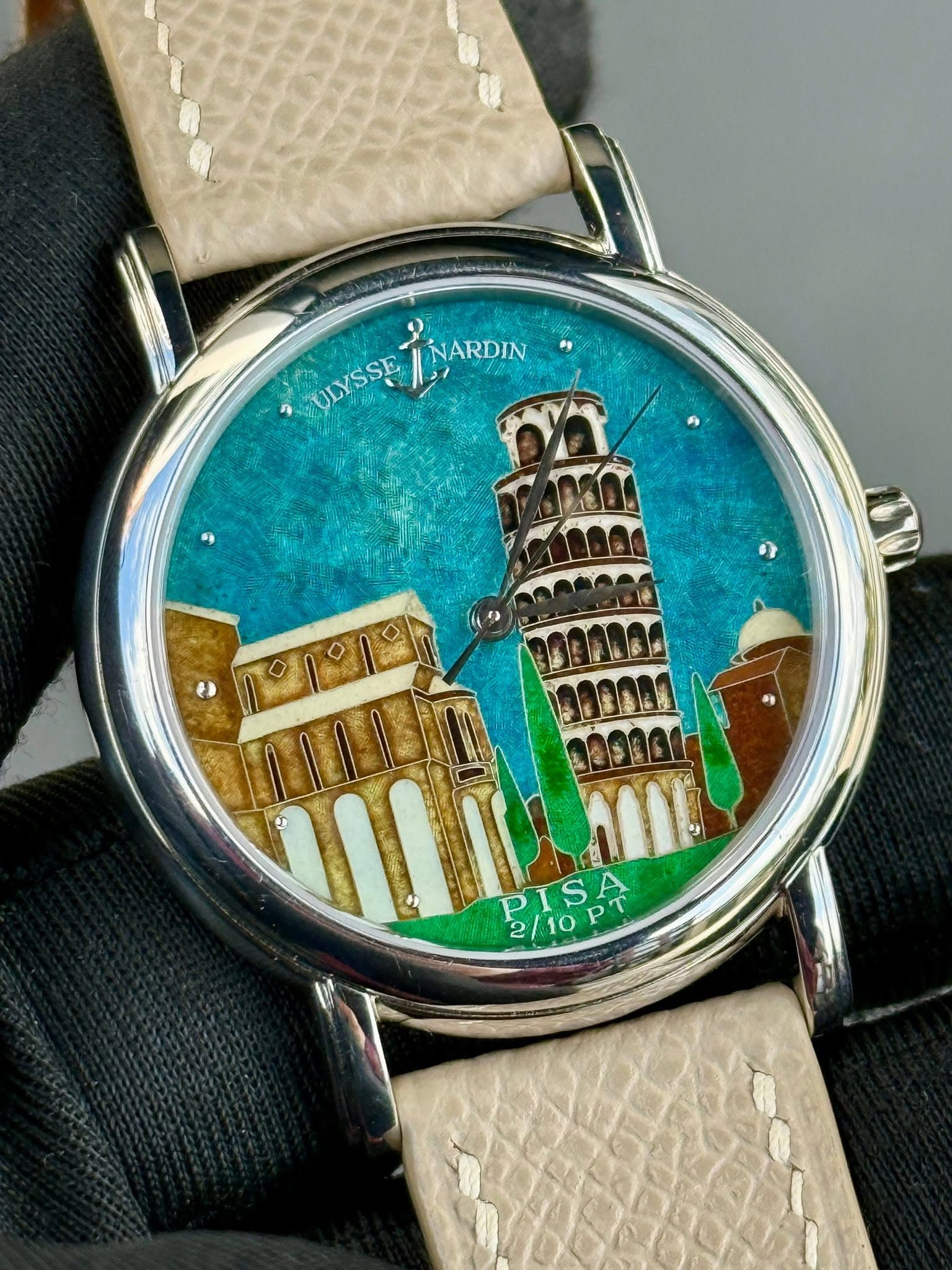 May be an image of wrist watch and text