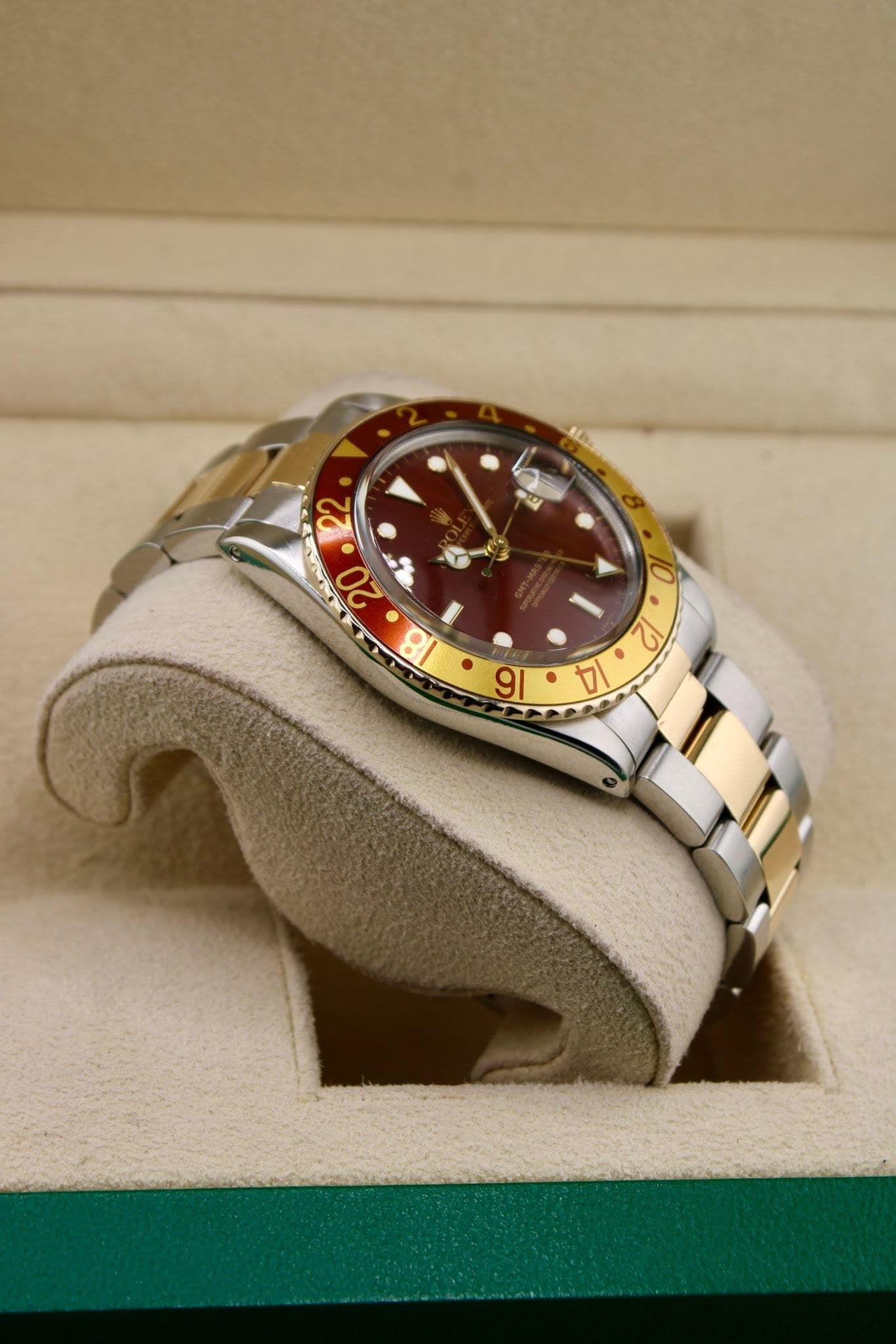 May be an image of wrist watch and text