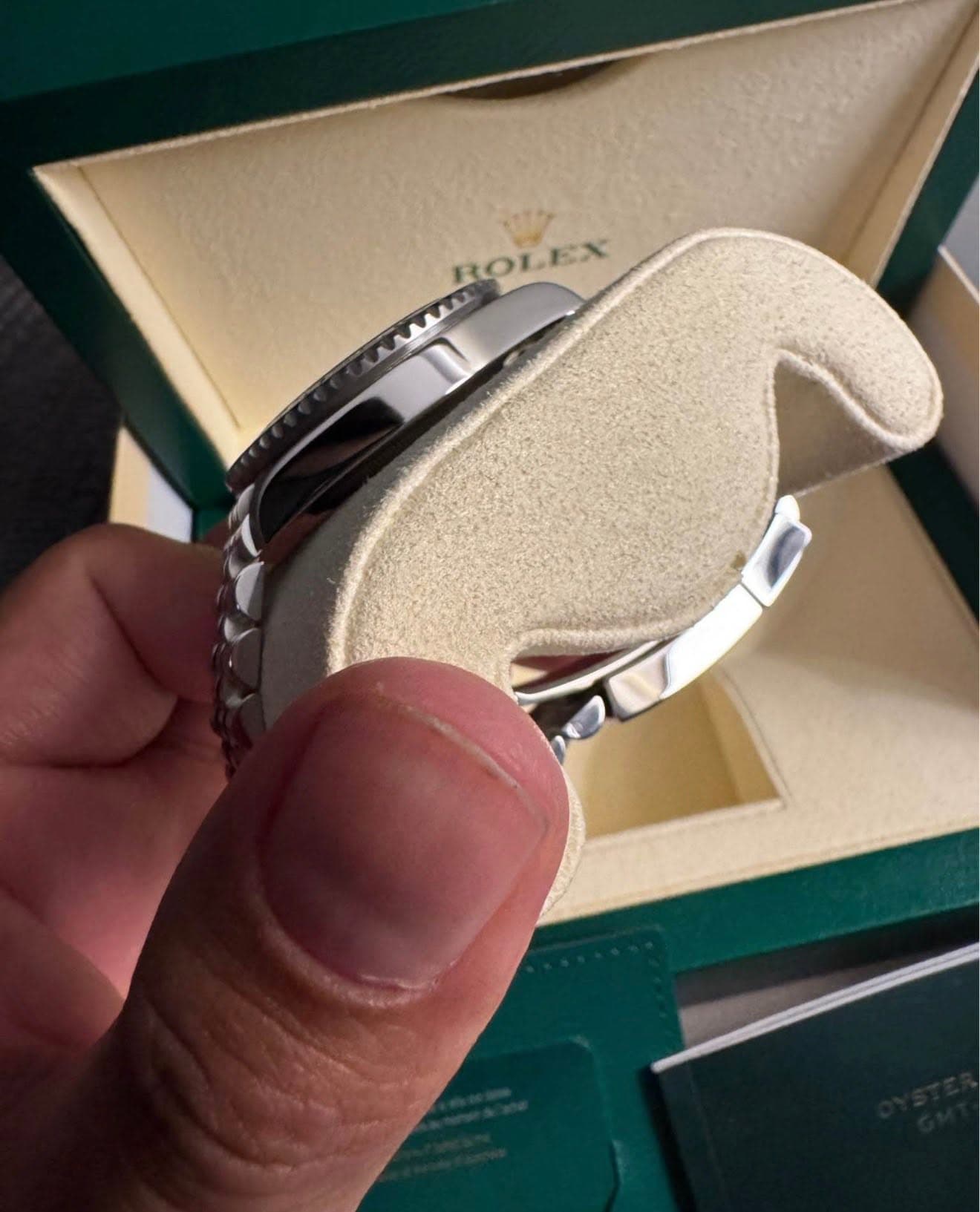 May be an image of wrist watch and text