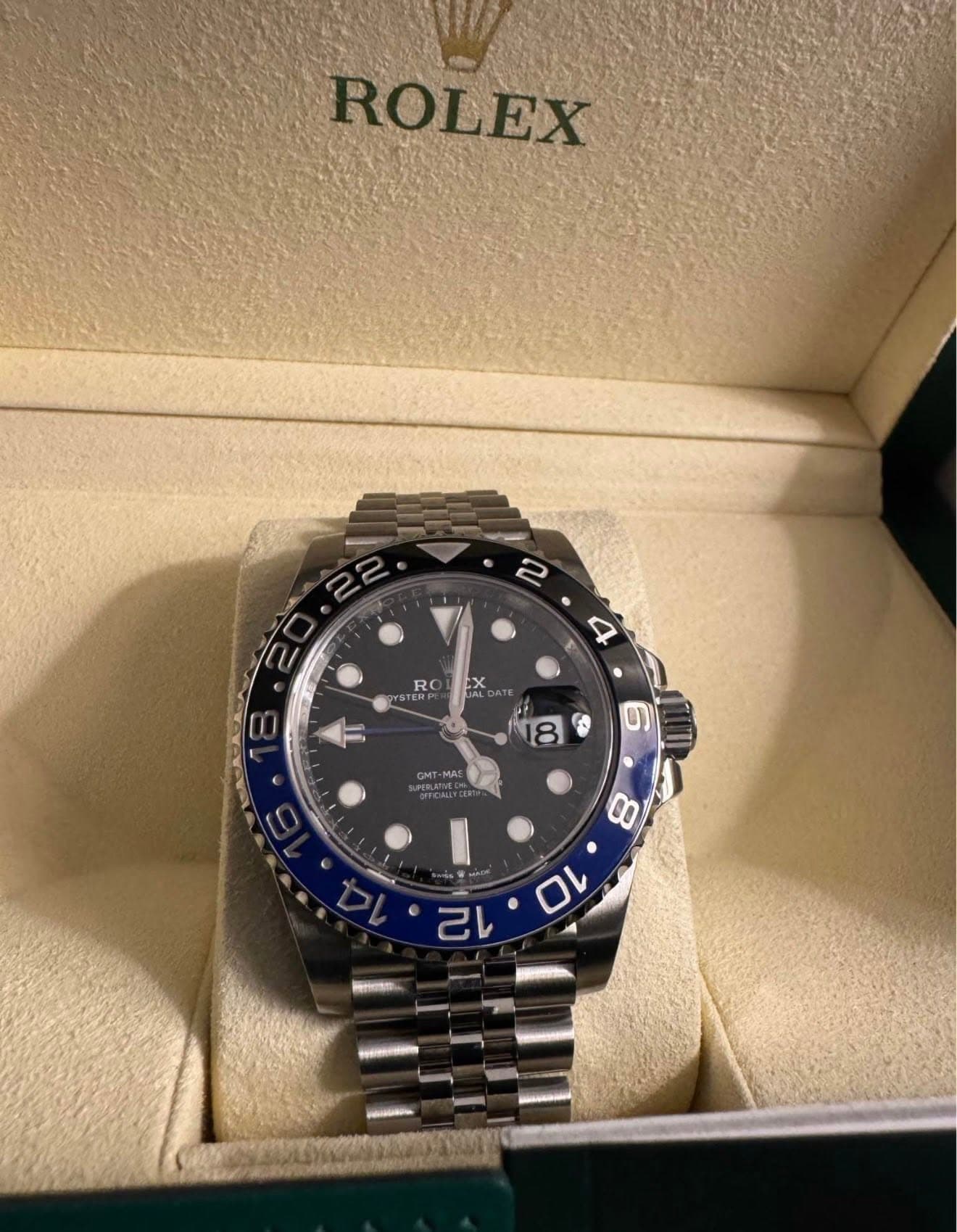 May be an image of wrist watch and text