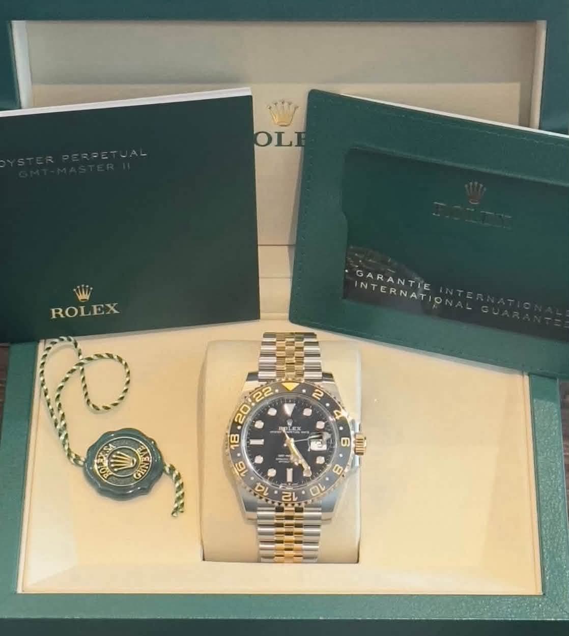 May be an image of wrist watch and text that says 'OLE ROLEX GARANTIE INTERNATION INTERNATIC 2 20:22 PLEX 18 O GINE 6 5 E ani 9 16 8 1q ብ 10'