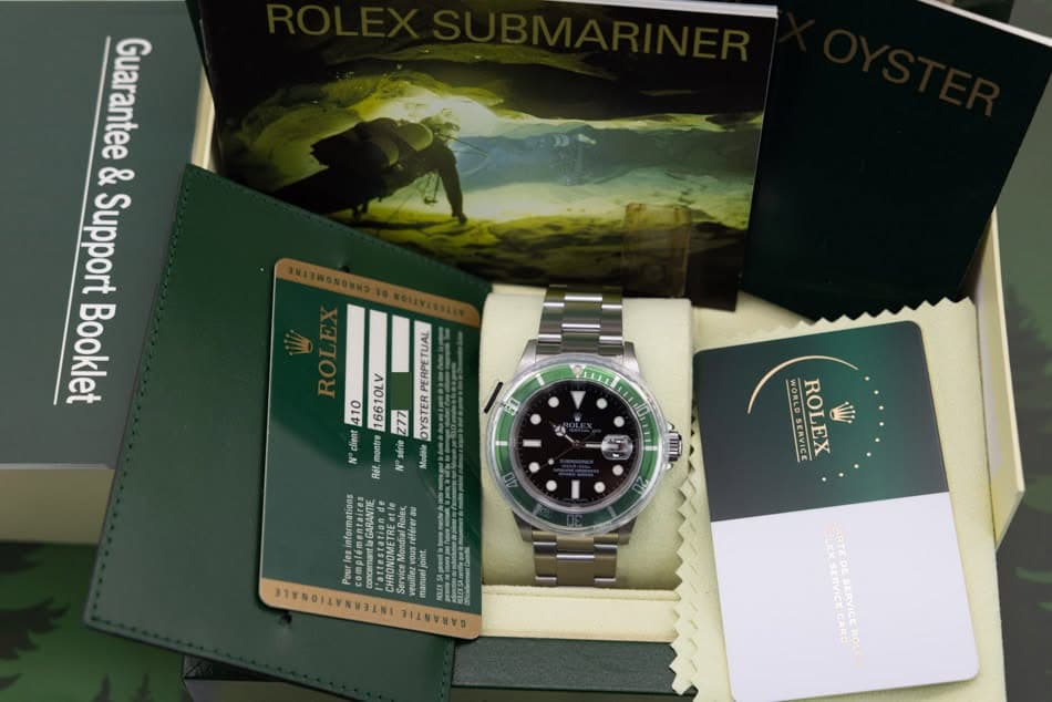 May be an image of wrist watch and text that says 'Guarantee & Support Booklet 60 PERPETUAL 410 16610LV Z77 OYSTER client montre Rat. Modera WORLD SERVIC SERVICE ROLEX iT ากกน 2…