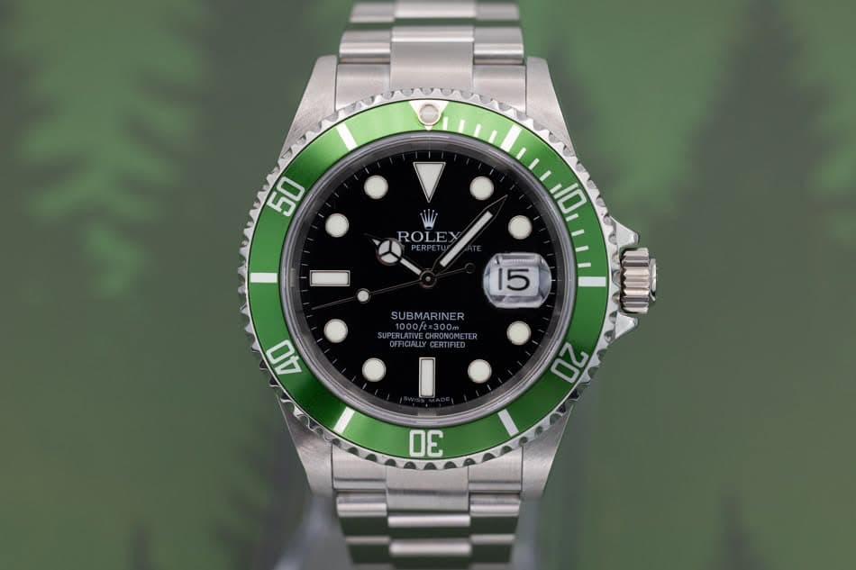 May be an image of wrist watch and text that says '50 ROLE 10 15 SUBMARINER 40 20 30'