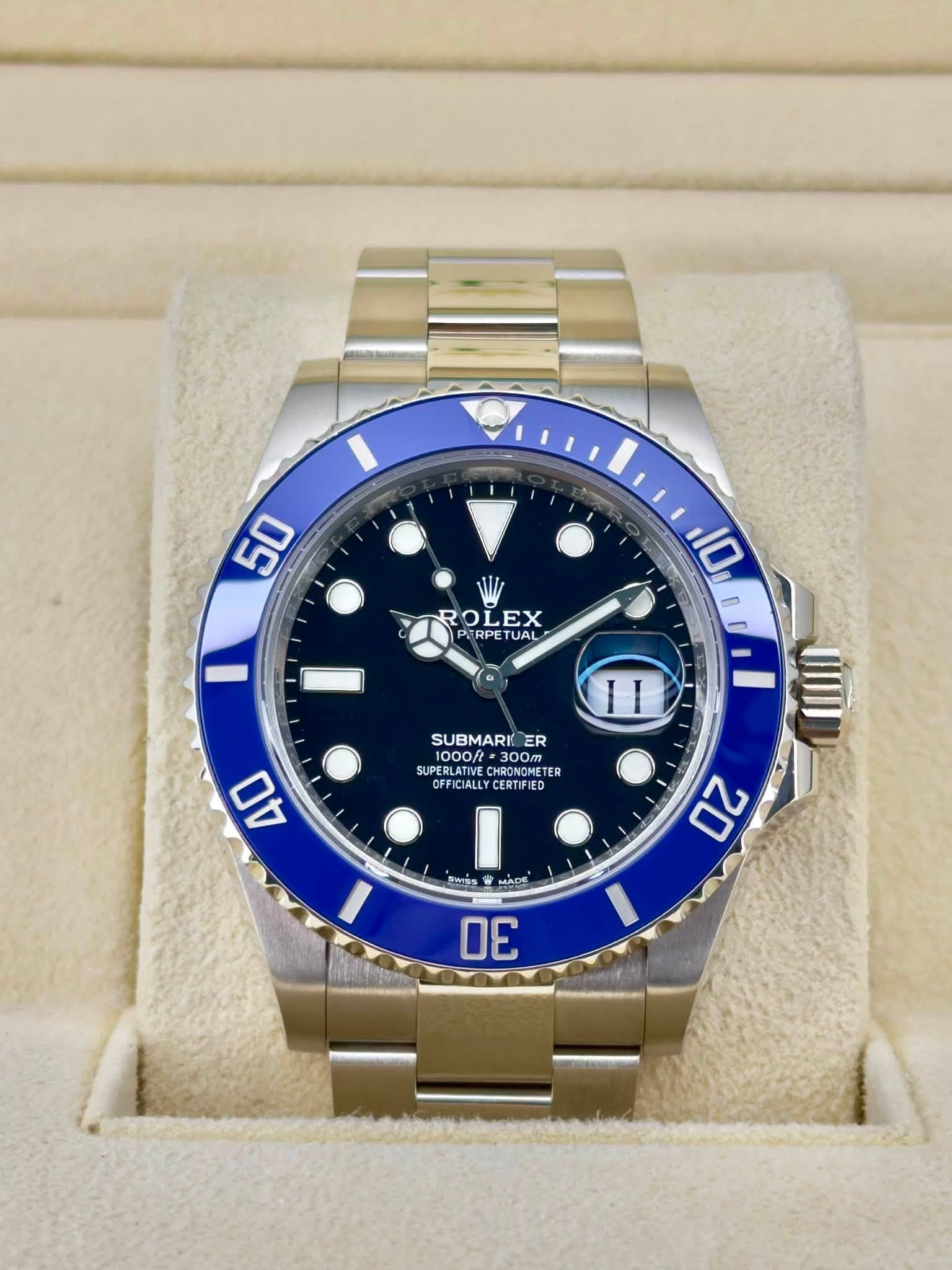 May be an image of wrist watch and text that says '50 10 ROLEX PRPETUAL JAL TUAL II SUBMARI ER 1000/ 1000/t 300m 300m SUPERLATIVE SUPERLATIVE UDONANET HRONOMETER ARONO TER…