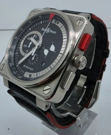 May be an image of wrist watch and text that says 'Be Ross & &Ross Ross 1o 6 20 00 O0 ى B-ROCKET'