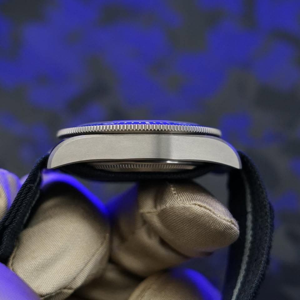 May be an image of wrist watch and knife