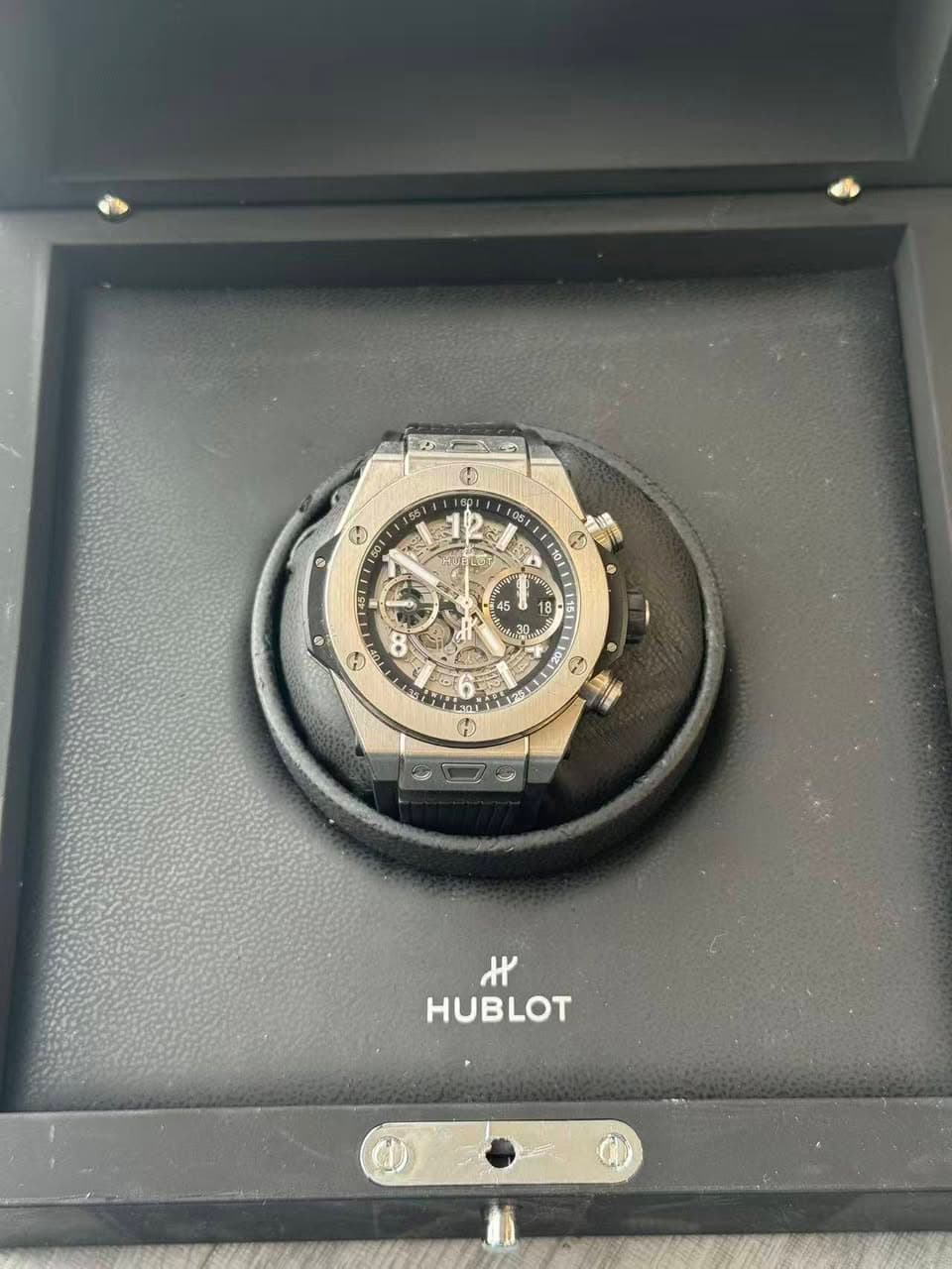 May be an image of wrist watch and text