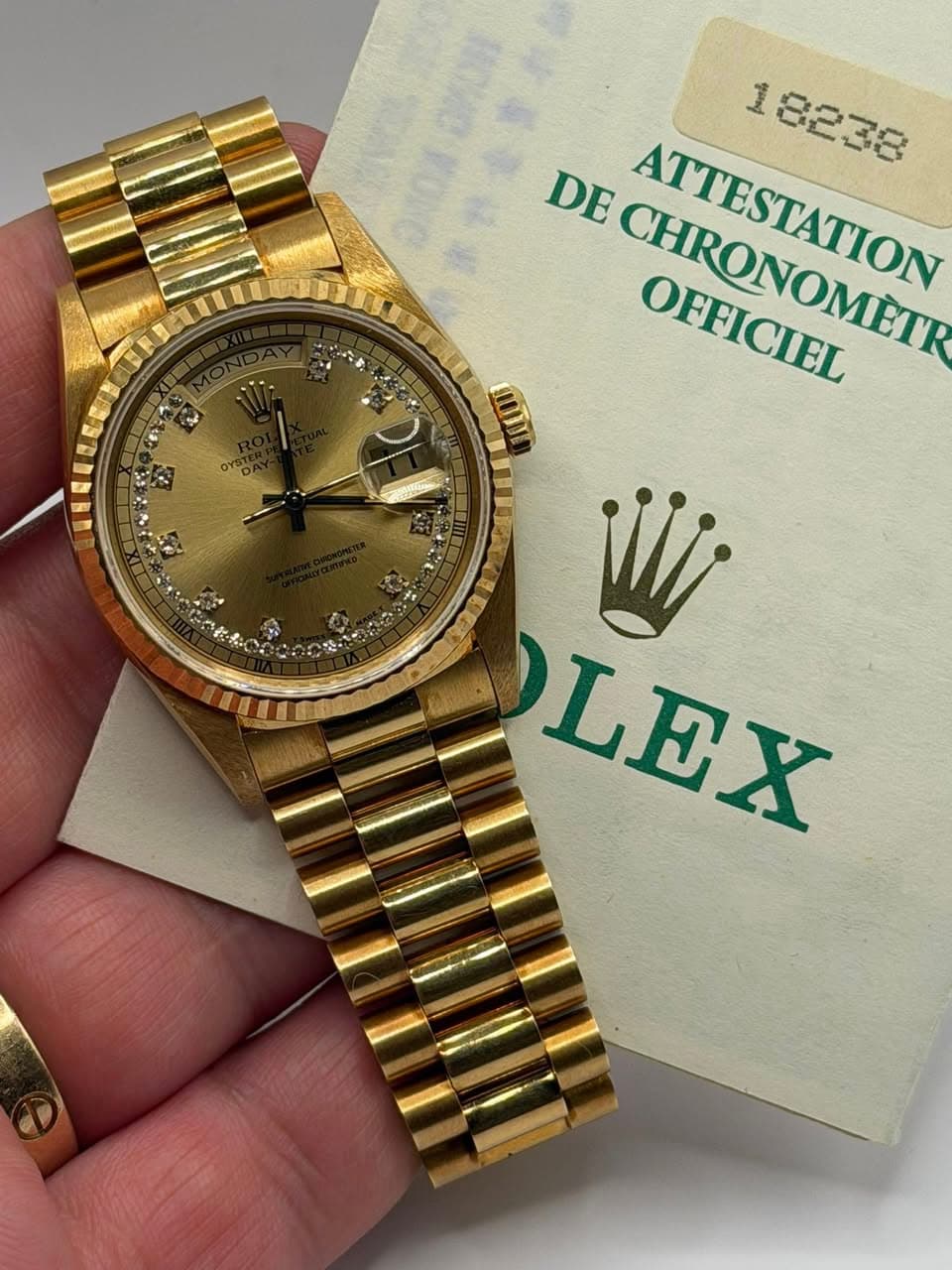 May be an image of wrist watch and text