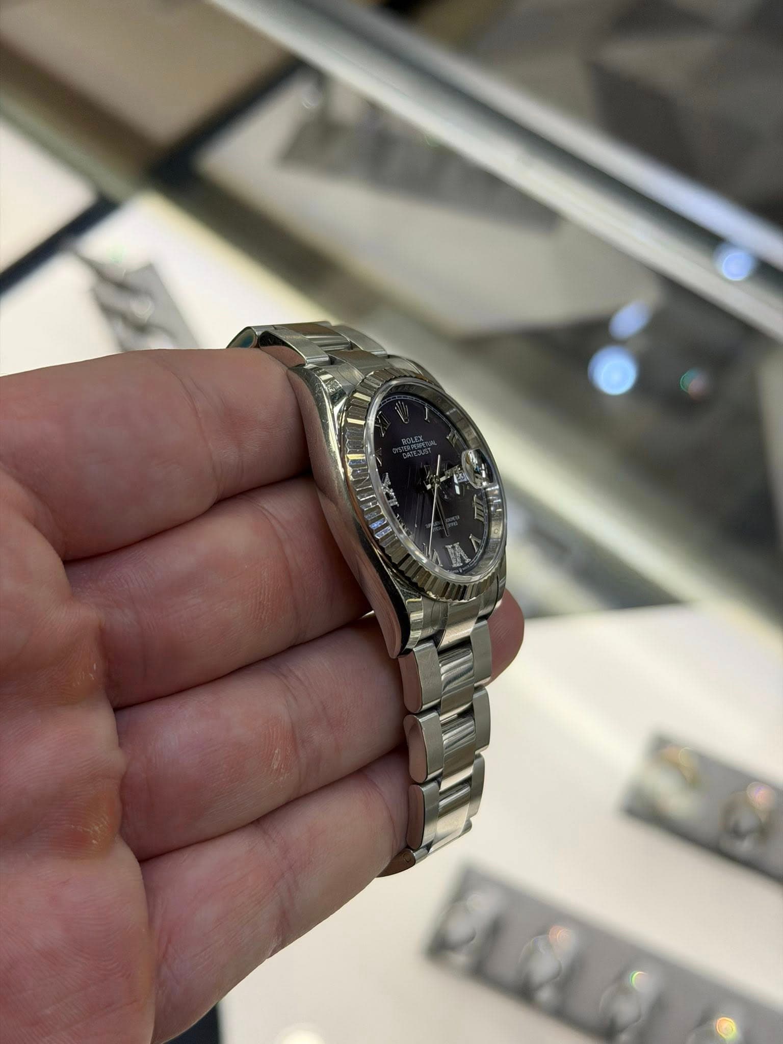 May be an image of wrist watch