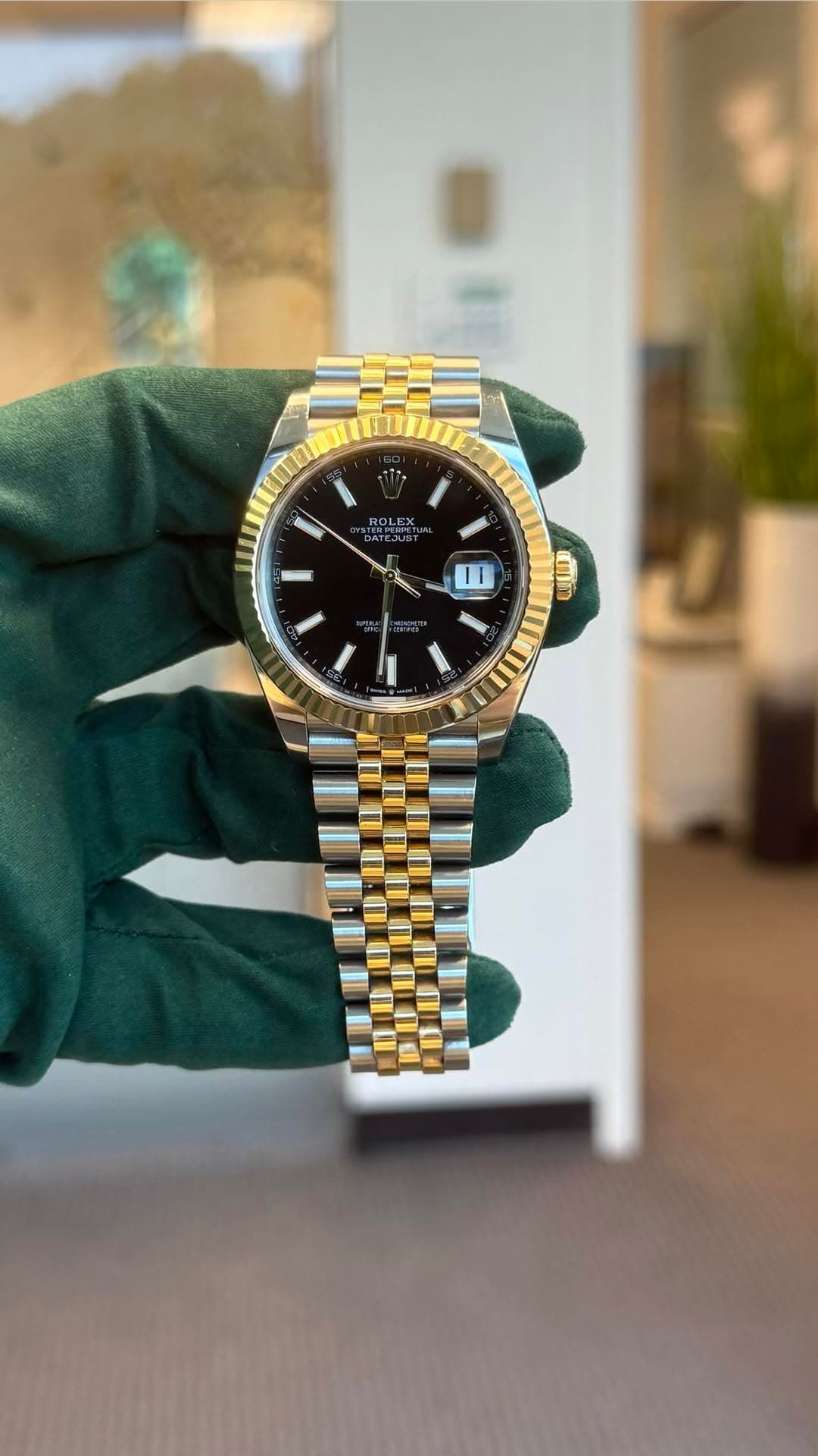 May be an image of wrist watch and text